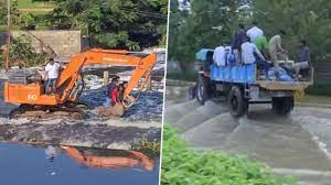 People in Bangalore are using JCB to go office...