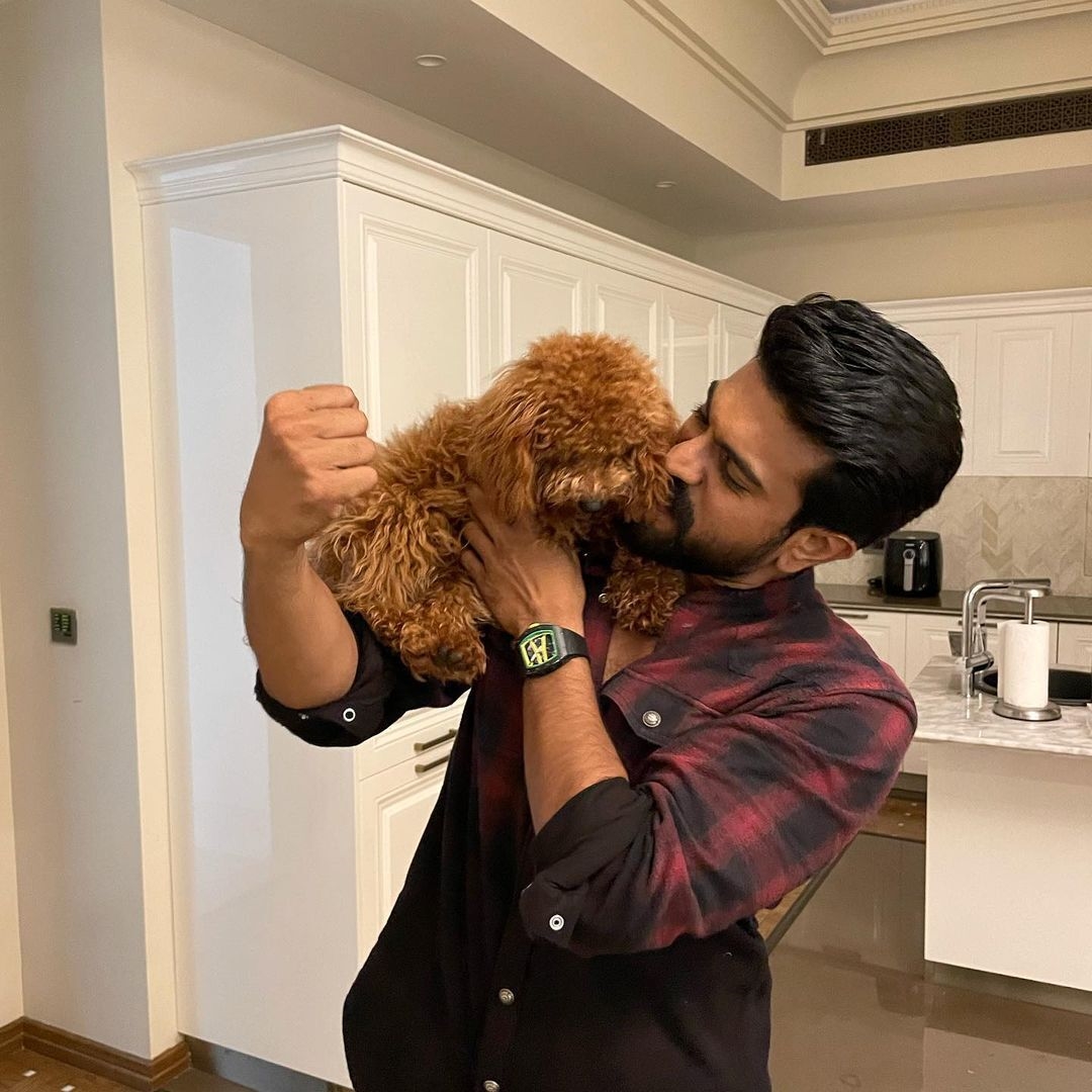 Ram Charan New Clicks With Dogs