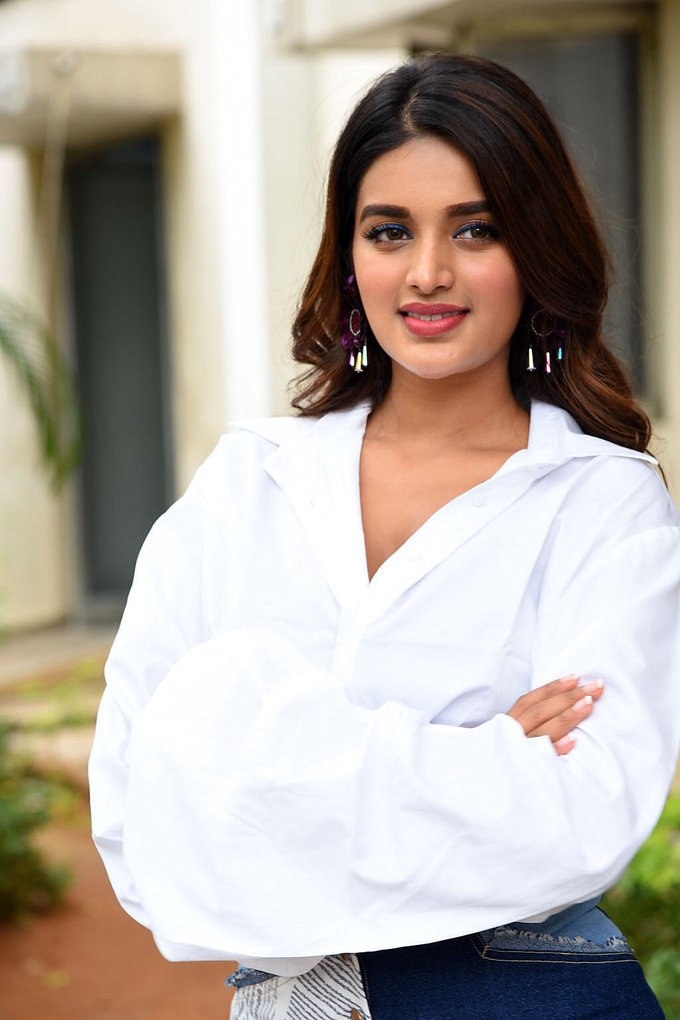 Actress Nidhhi Agerwal Looking Gorgeous In White Top