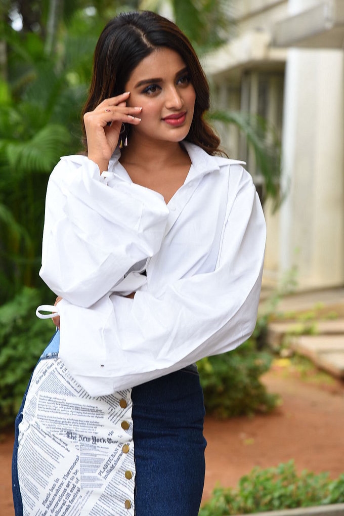 Actress Nidhhi Agerwal Looking Gorgeous In White Top