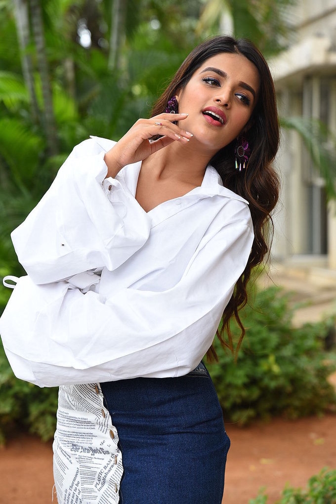 Actress Nidhhi Agerwal Looking Gorgeous In White Top