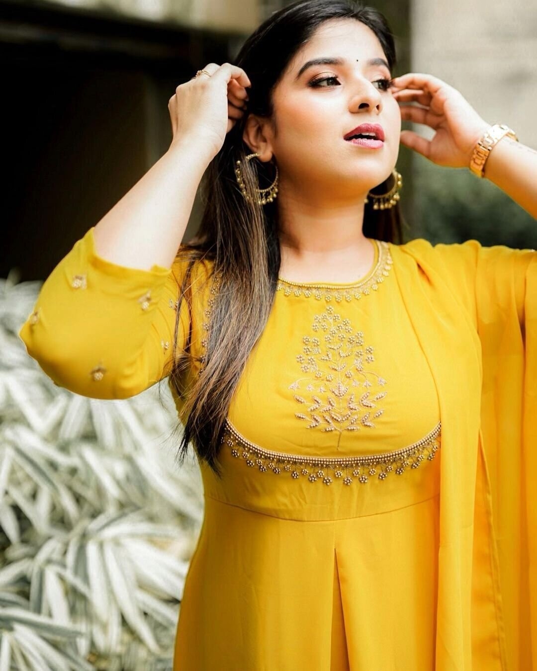 Aparna Thomas Photos In Yellow Dress