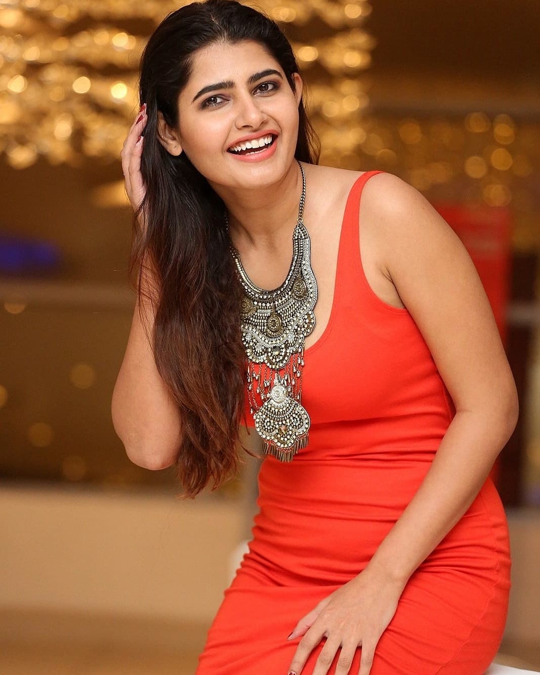 Malvika Sharma Hot Photos In Orange Dress