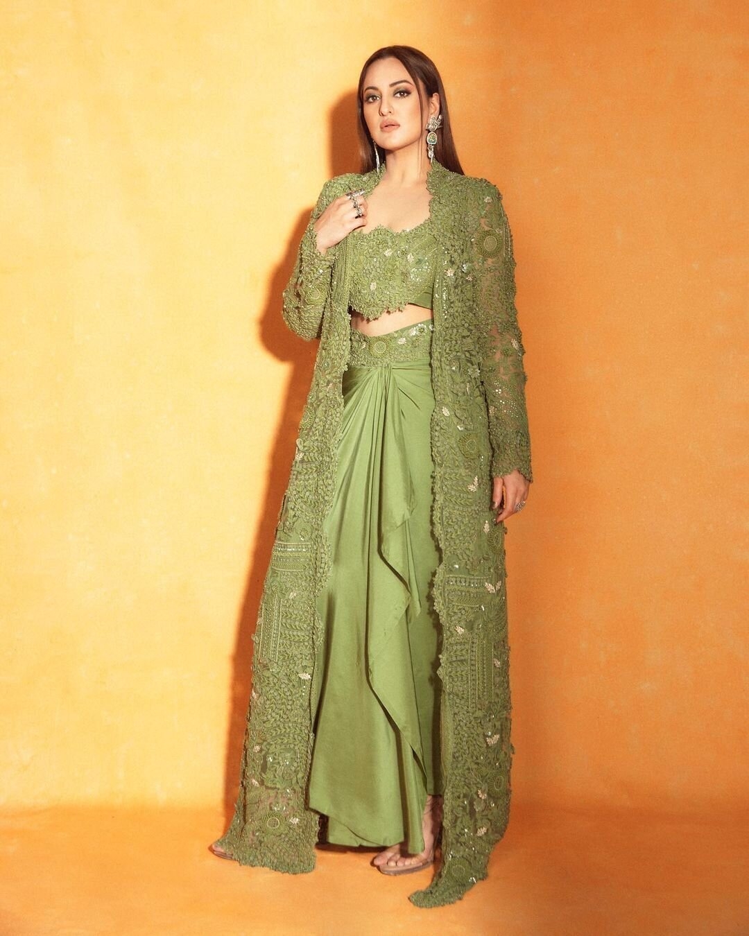 Sonakshi Sinha in a Sleeveless Green Drapes Silk Jersey Dress for women by  Mandira Wirk