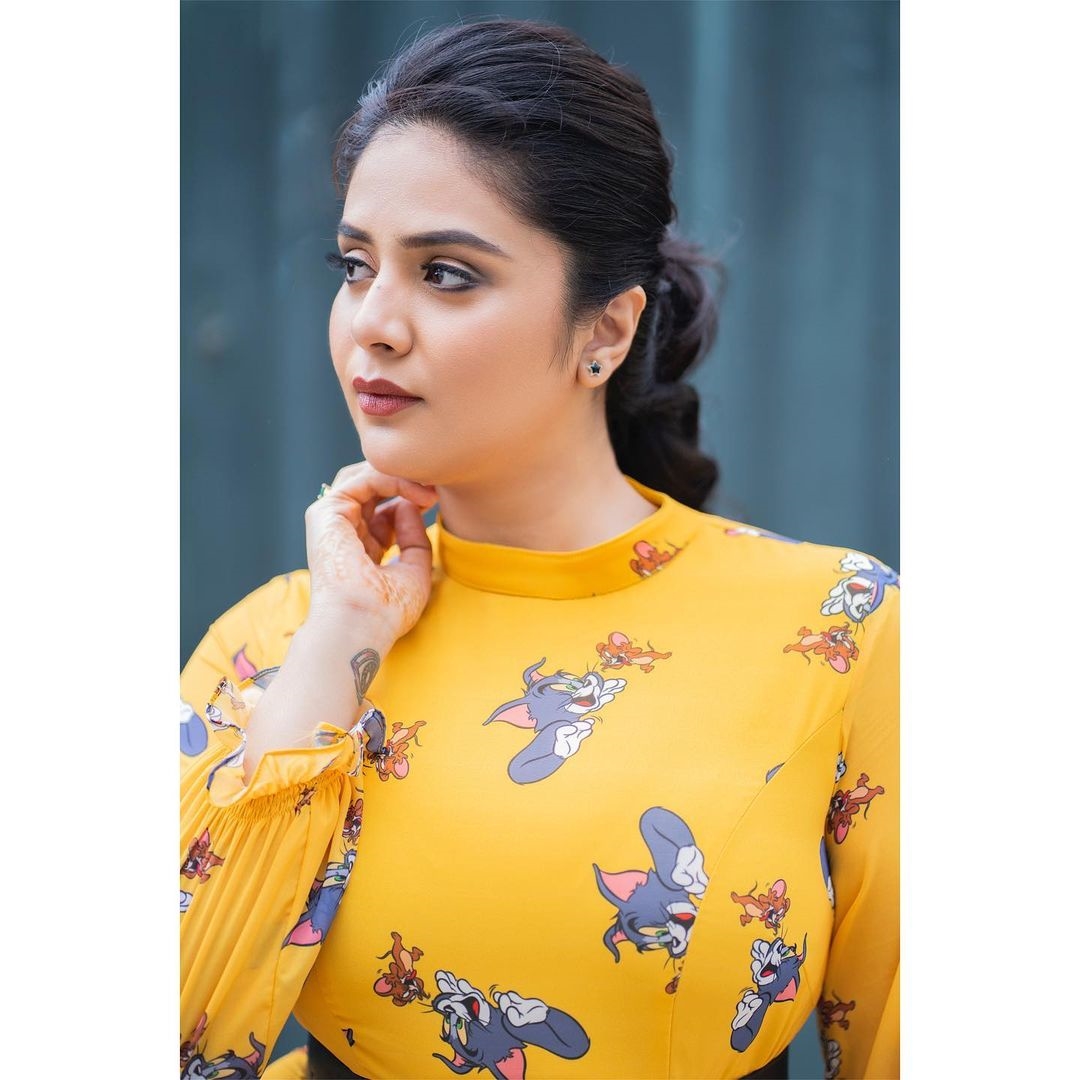 Sreemukhi Hot Photos In Yellow Dress