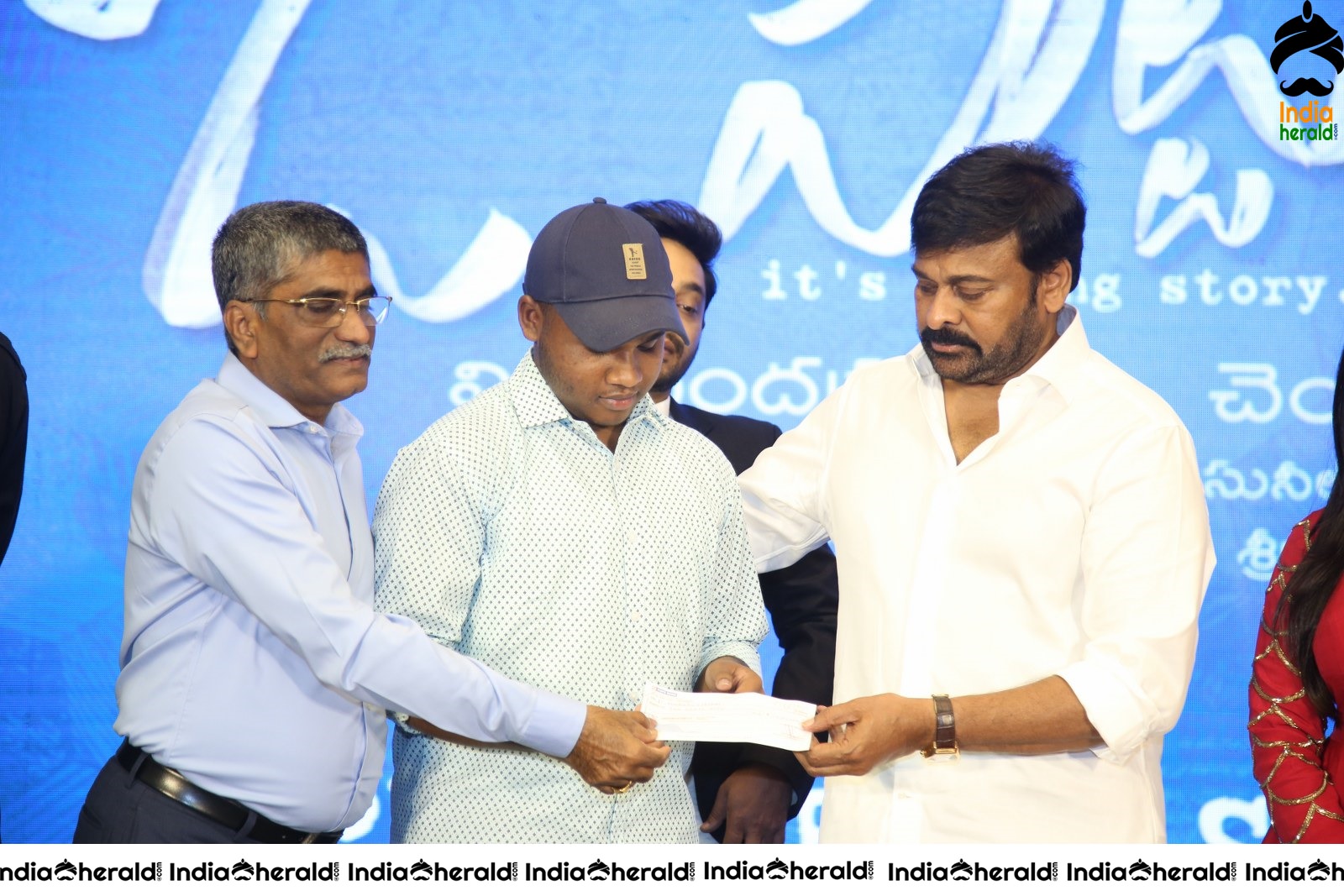 Actor Chiranjeevi Seen Interacting with other actors during an event Set 3