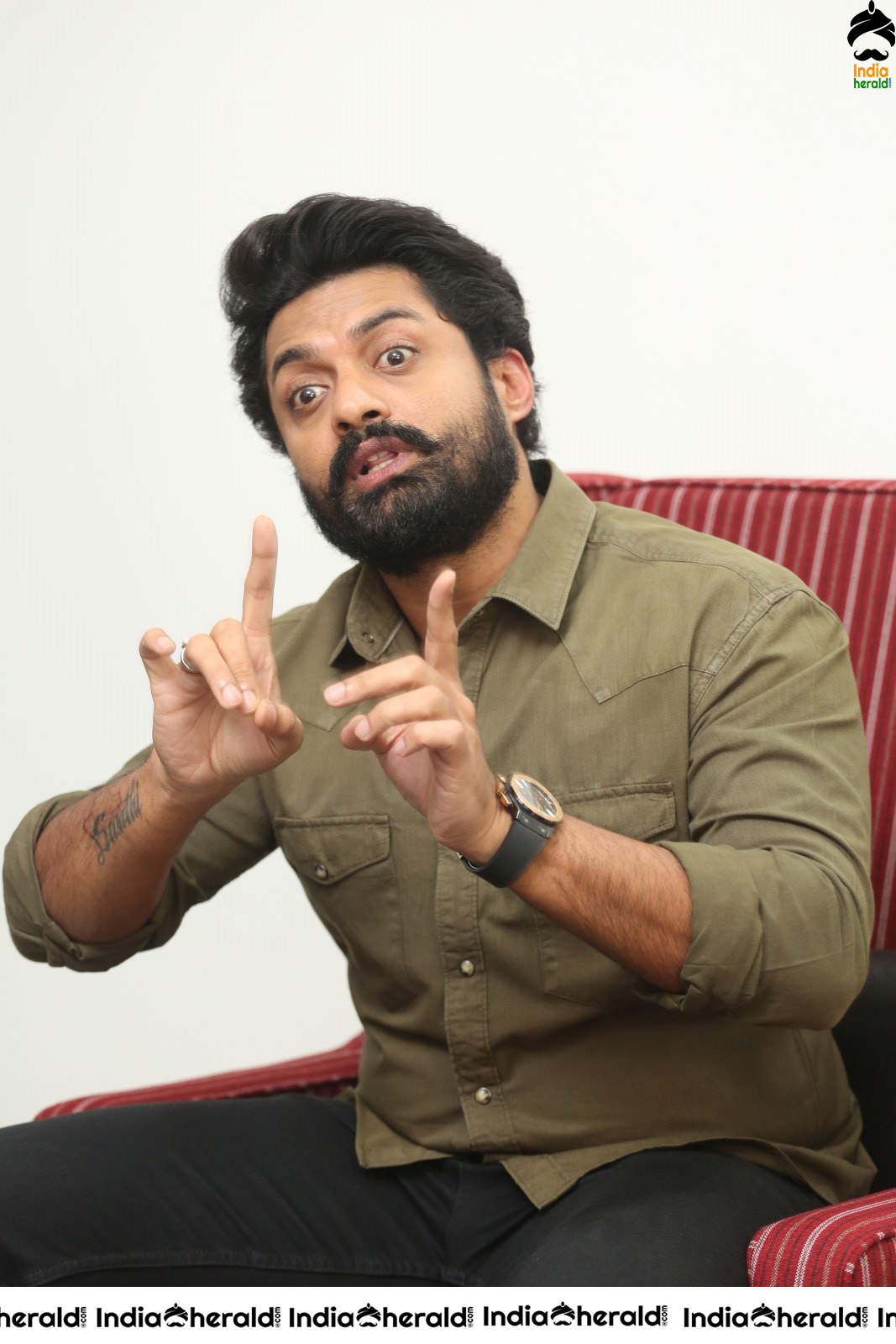 Actor Nandamuri Kalyanram shows various expressions in his face during a media interaction