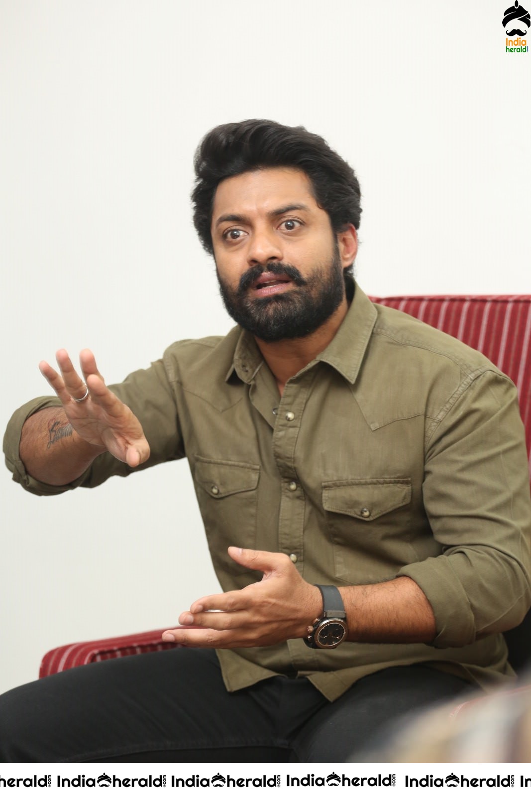 Actor Nandamuri Kalyanram shows various expressions in his face during a media interaction