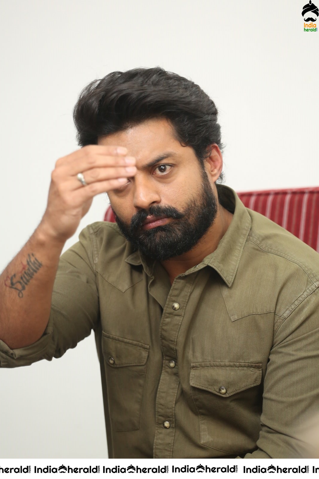 Actor Nandamuri Kalyanram shows various expressions in his face during a media interaction