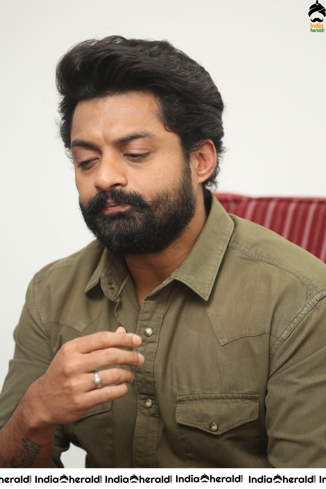 Actor Nandamuri Kalyanram shows various expressions in his face during a media interaction