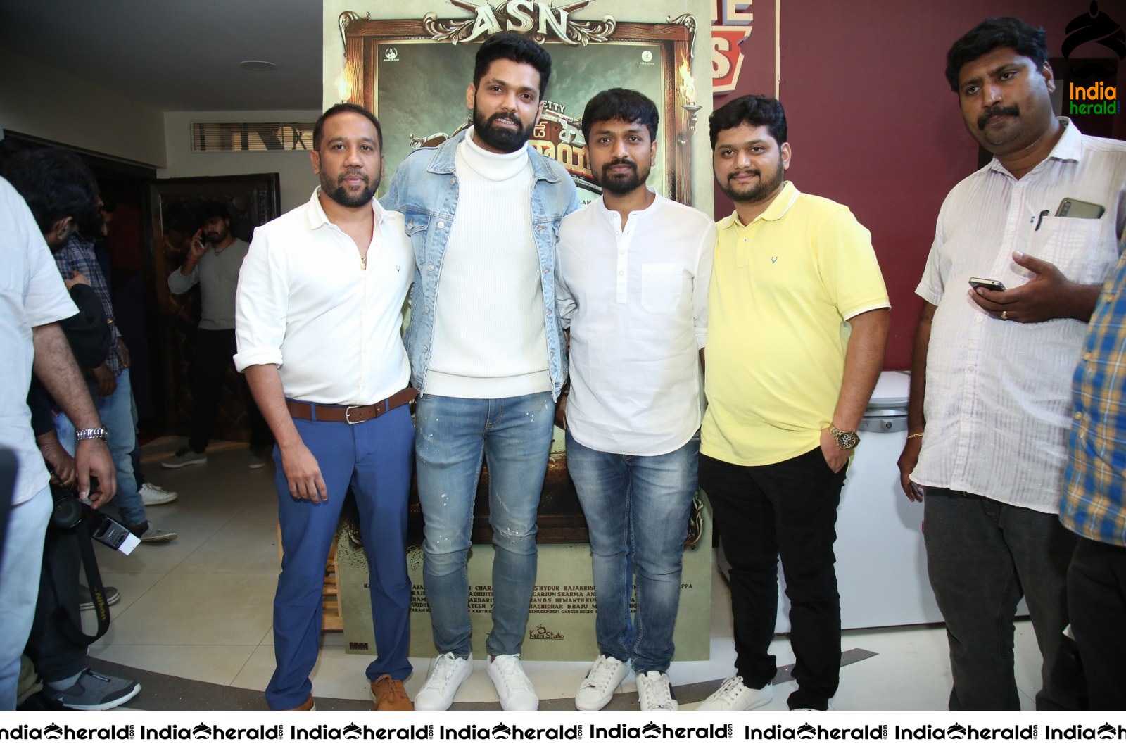 Actor Rakshit Shetty seen with the crew of Avane Srimannarayana Set 2