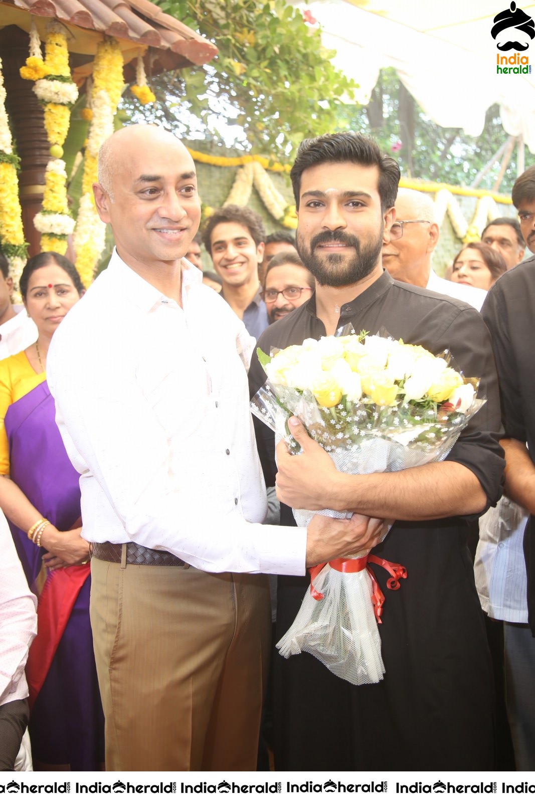 Actor Ram Charan draped in Black Set 1