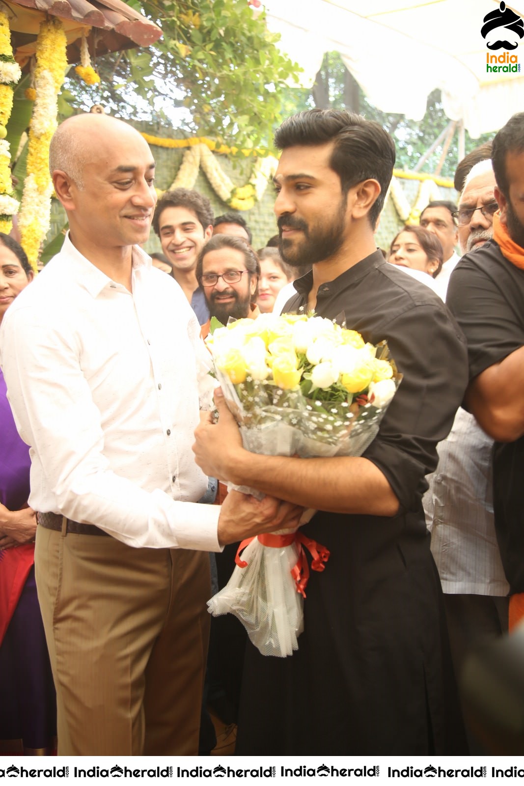 Actor Ram Charan draped in Black Set 1