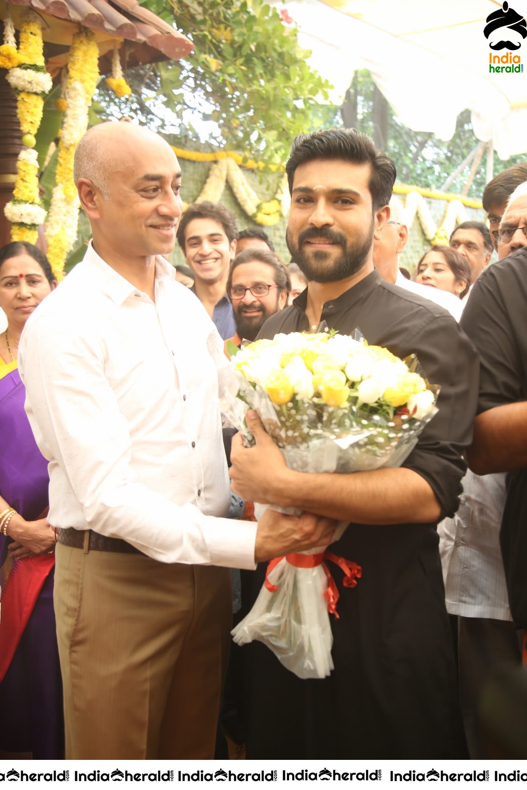 Actor Ram Charan draped in Black Set 1