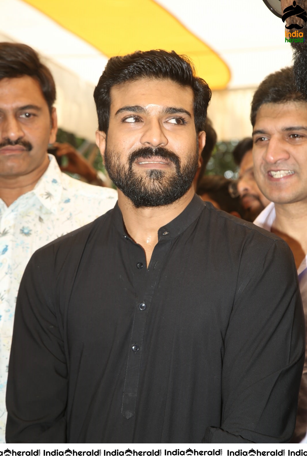 Actor Ram Charan draped in Black Set 2