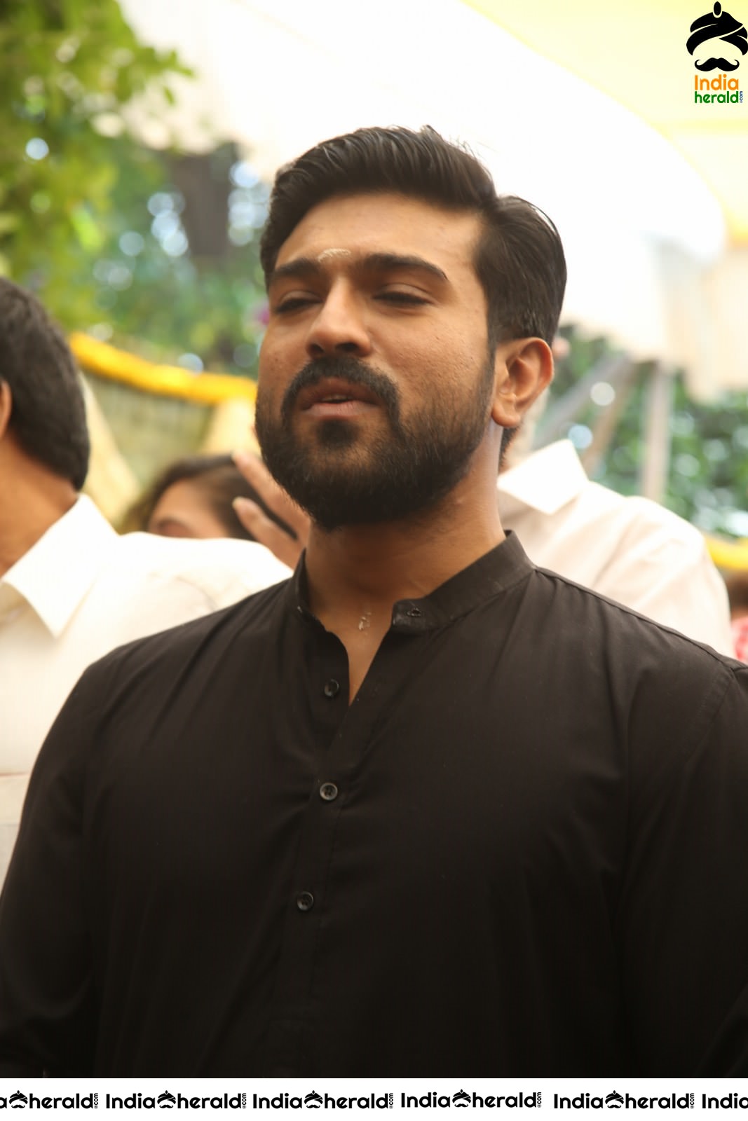 Actor Ram Charan draped in Black Set 2