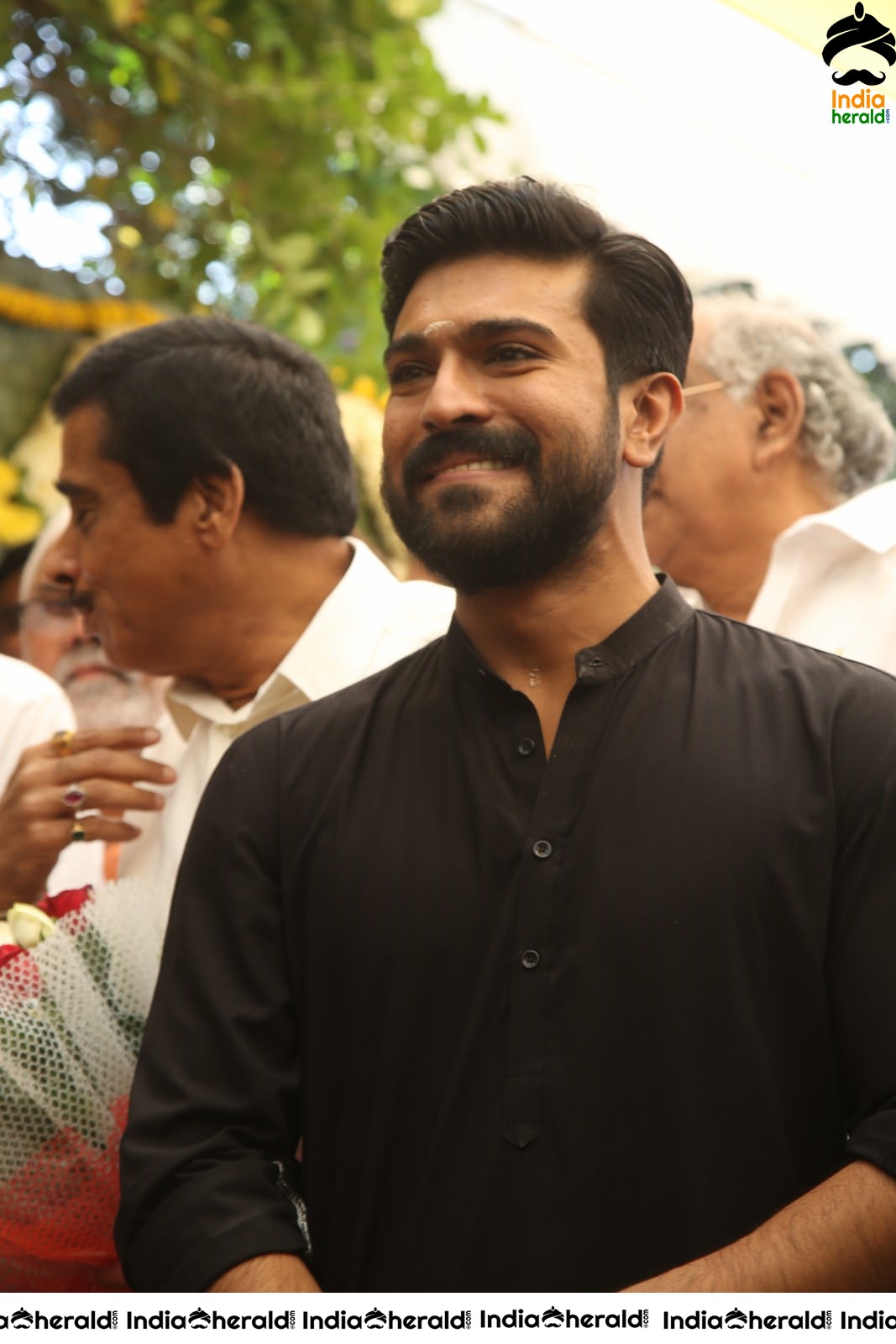 Actor Ram Charan draped in Black Set 2