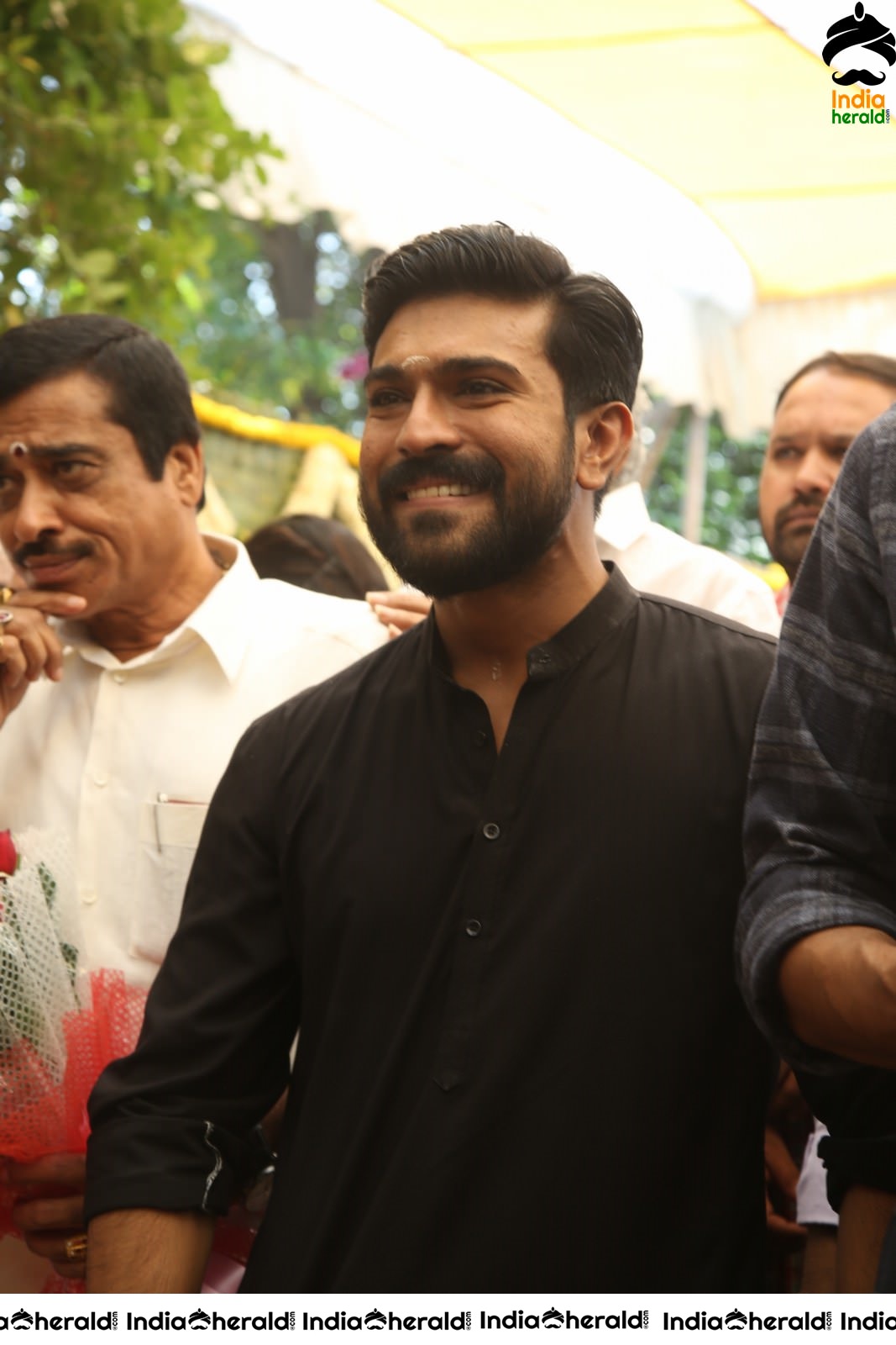 Actor Ram Charan draped in Black Set 2