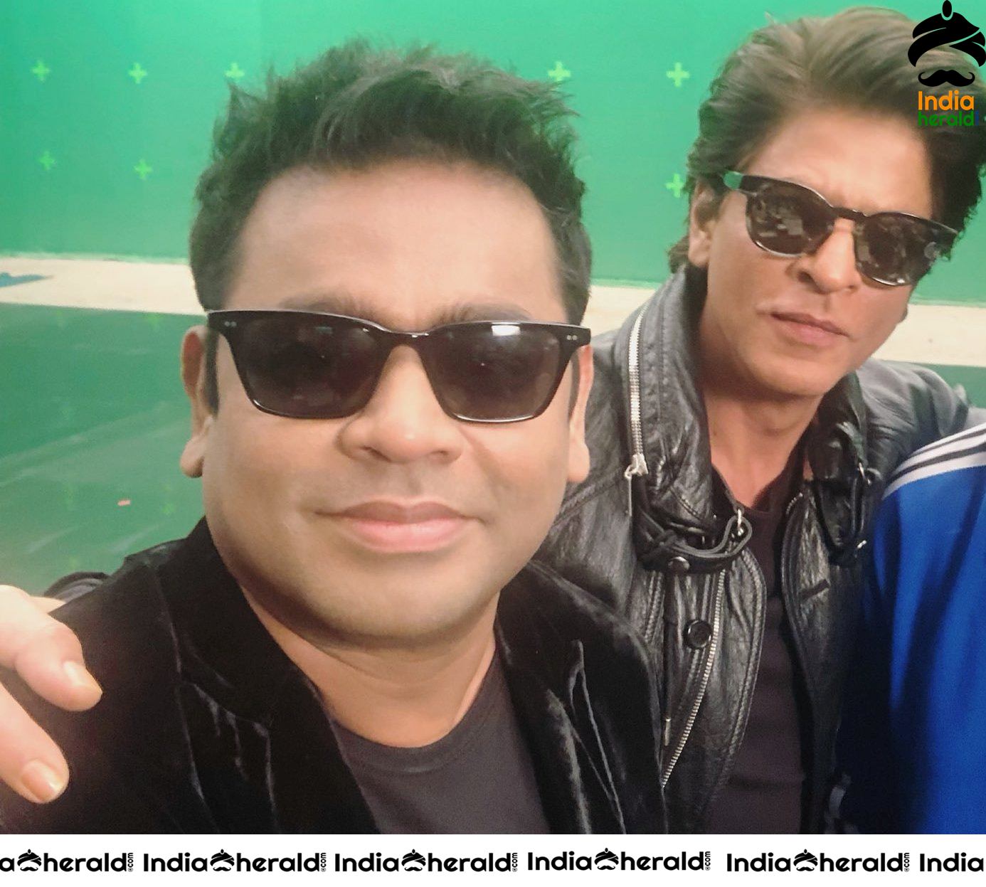 Actor Shah Rukh Khan is seen with A R Rahman and his son A R Ameen