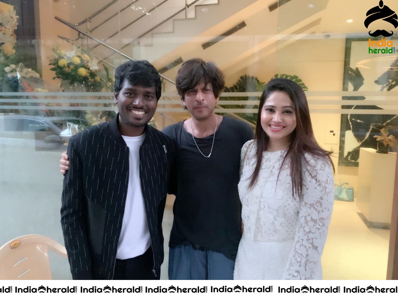 Actor Shah Rukh Khan with Director Atlee and his wife Priya