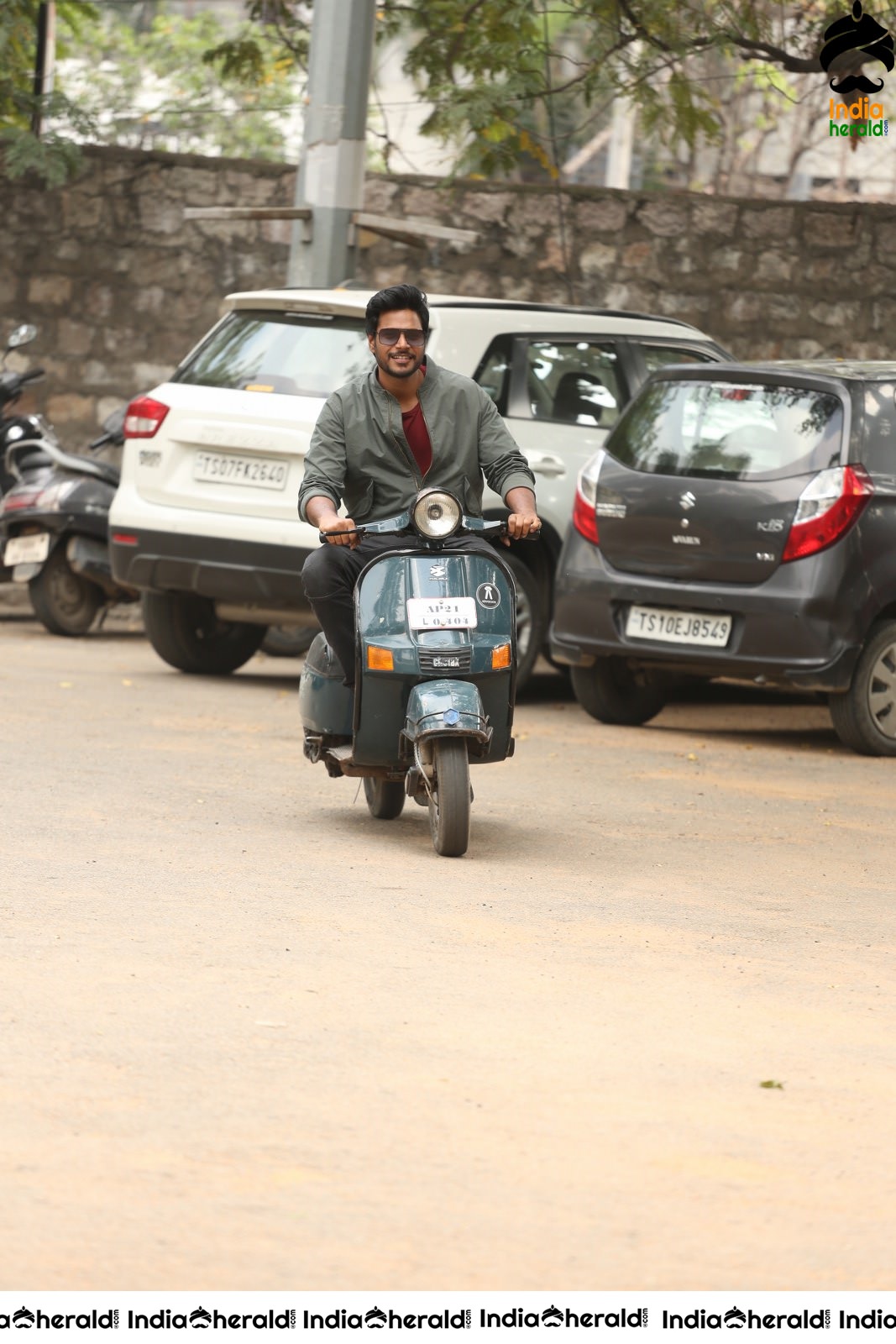 Actor Sundeep Kishan riding Scooter with HansikaMotwani