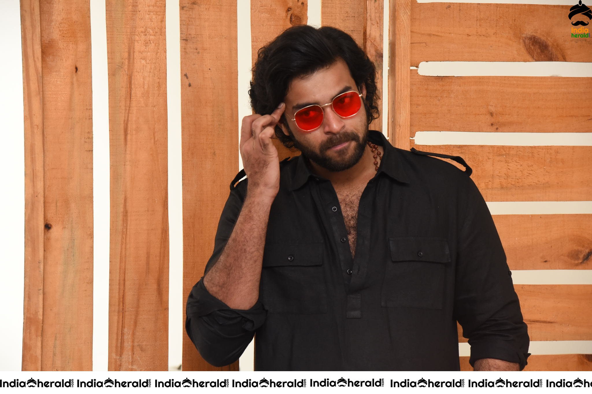 Actor Varun Tej Looking Dashing in Black and Red Coolers Set 1