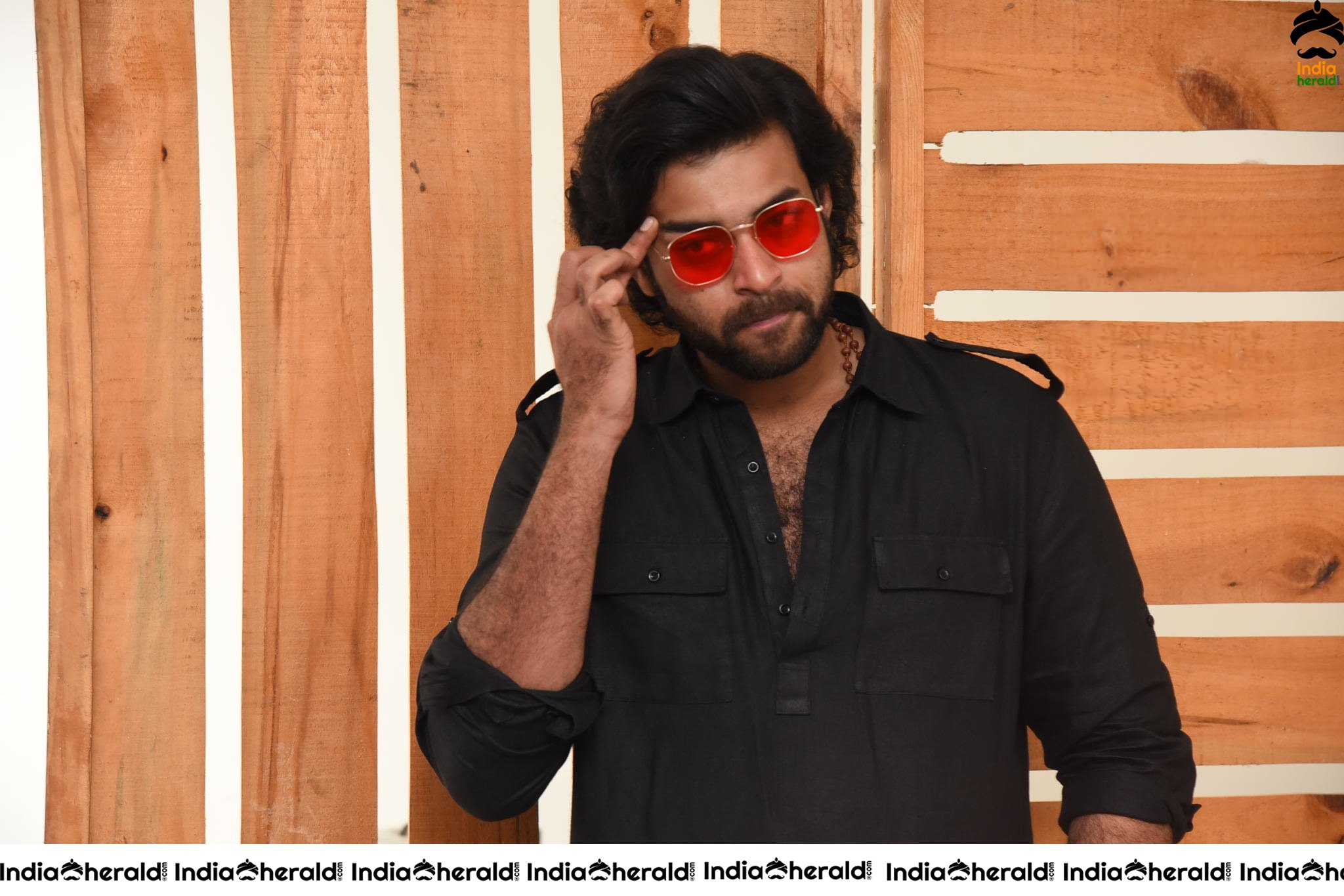 Actor Varun Tej Looking Dashing in Black and Red Coolers Set 1