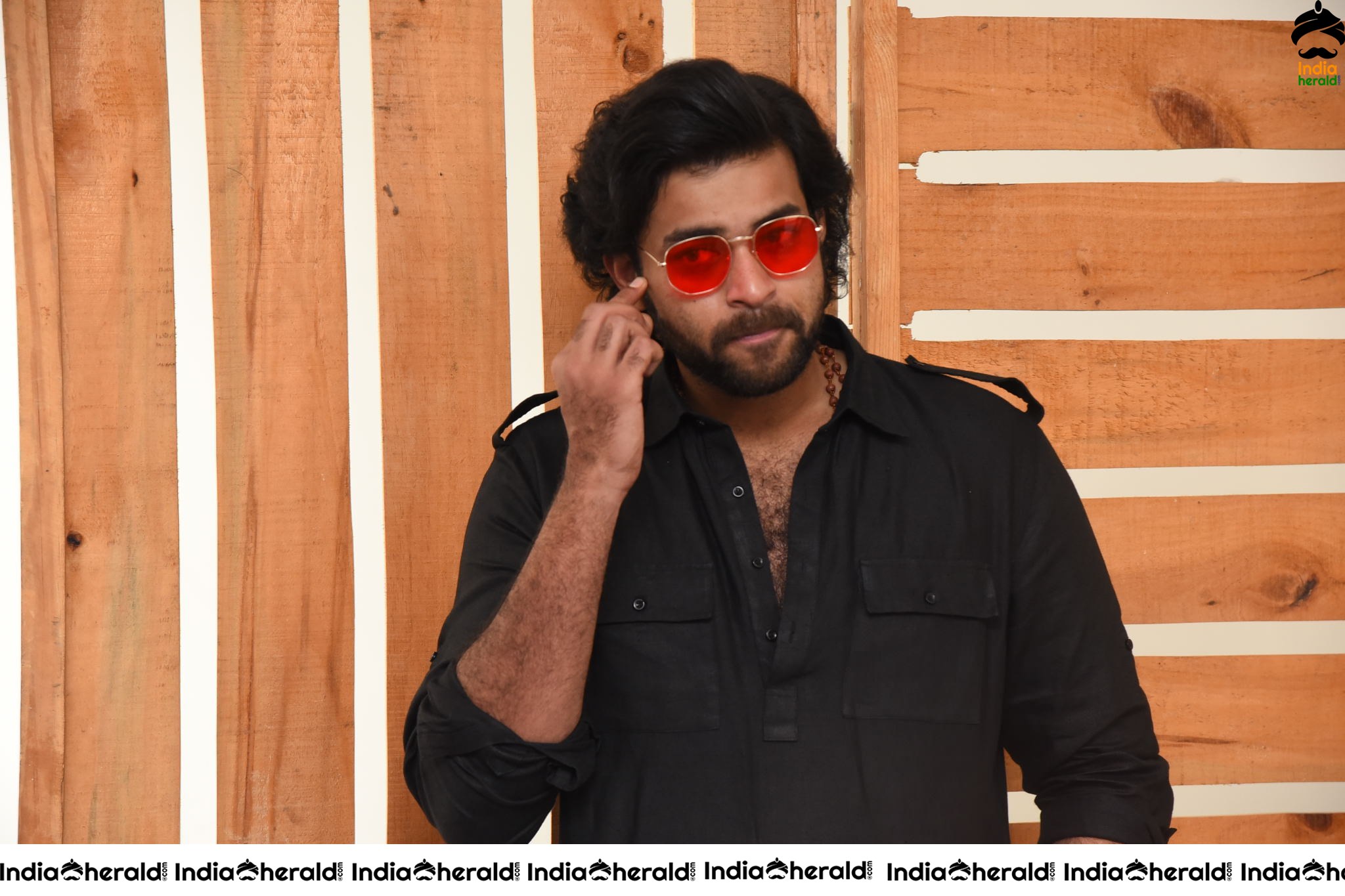 Actor Varun Tej Looking Dashing in Black and Red Coolers Set 1