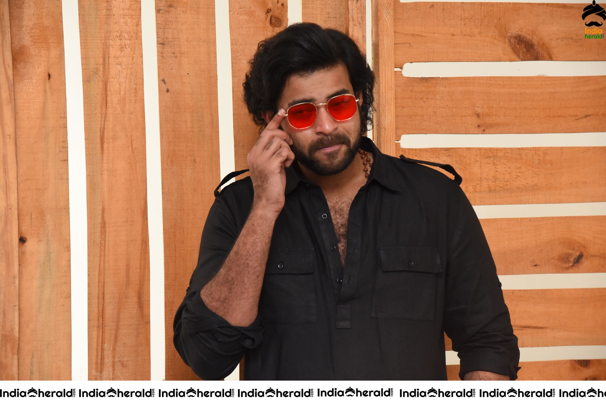 Actor Varun Tej Looking Dashing in Black and Red Coolers Set 1
