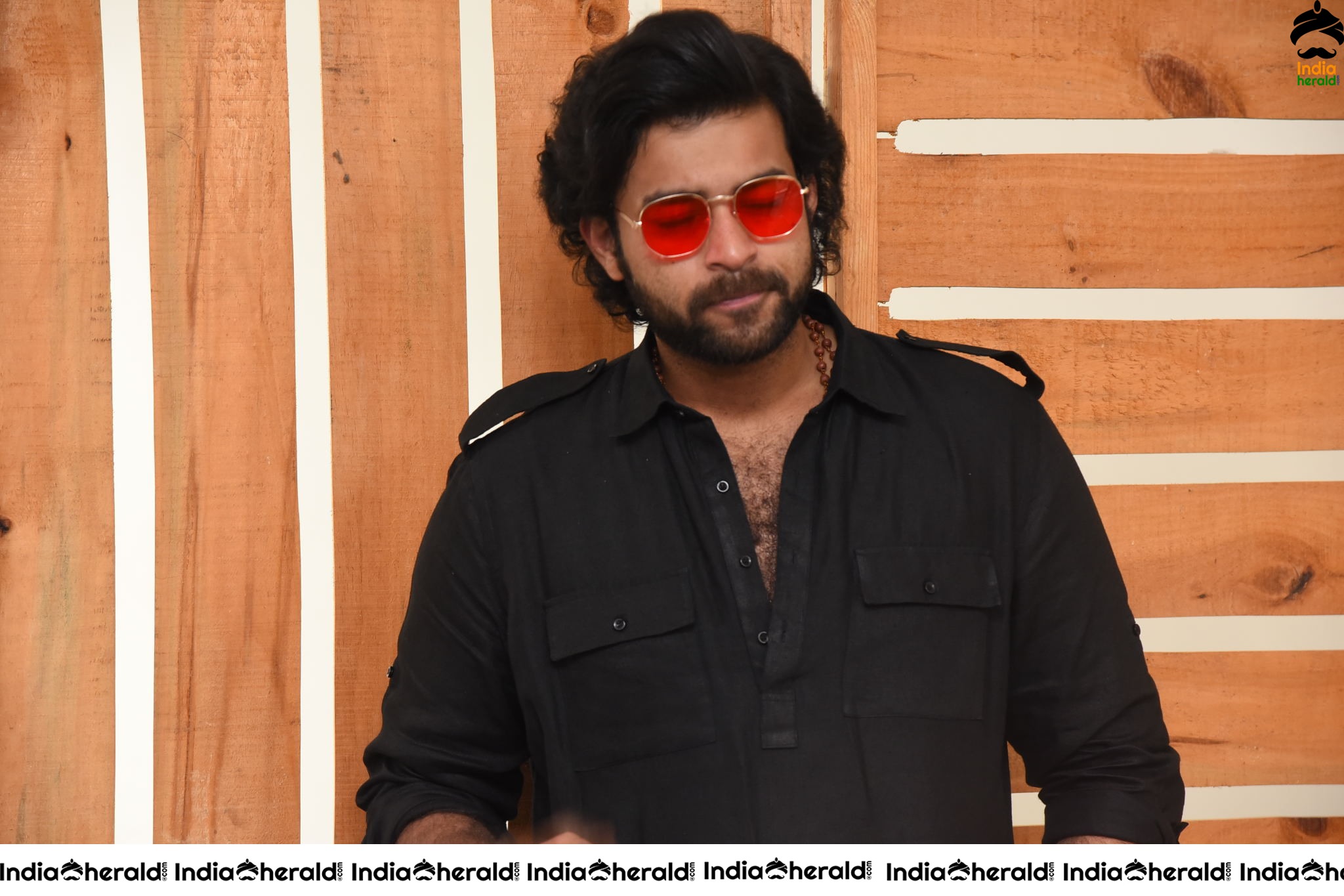 Actor Varun Tej Looking Dashing in Black and Red Coolers Set 1