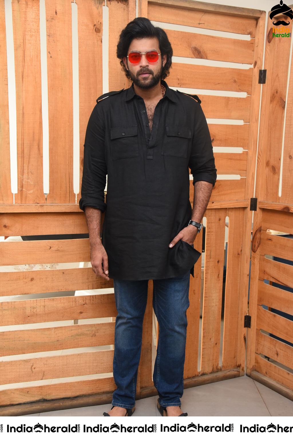 Actor Varun Tej Looking Dashing in Black and Red Coolers Set 2