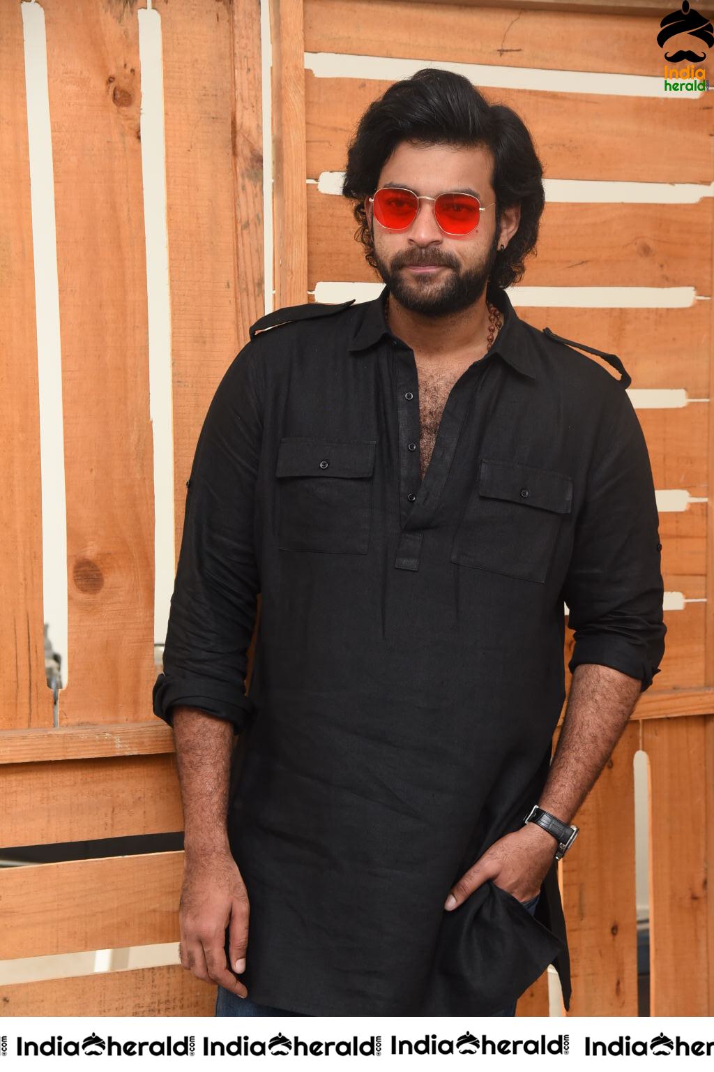 Actor Varun Tej Looking Dashing in Black and Red Coolers Set 2