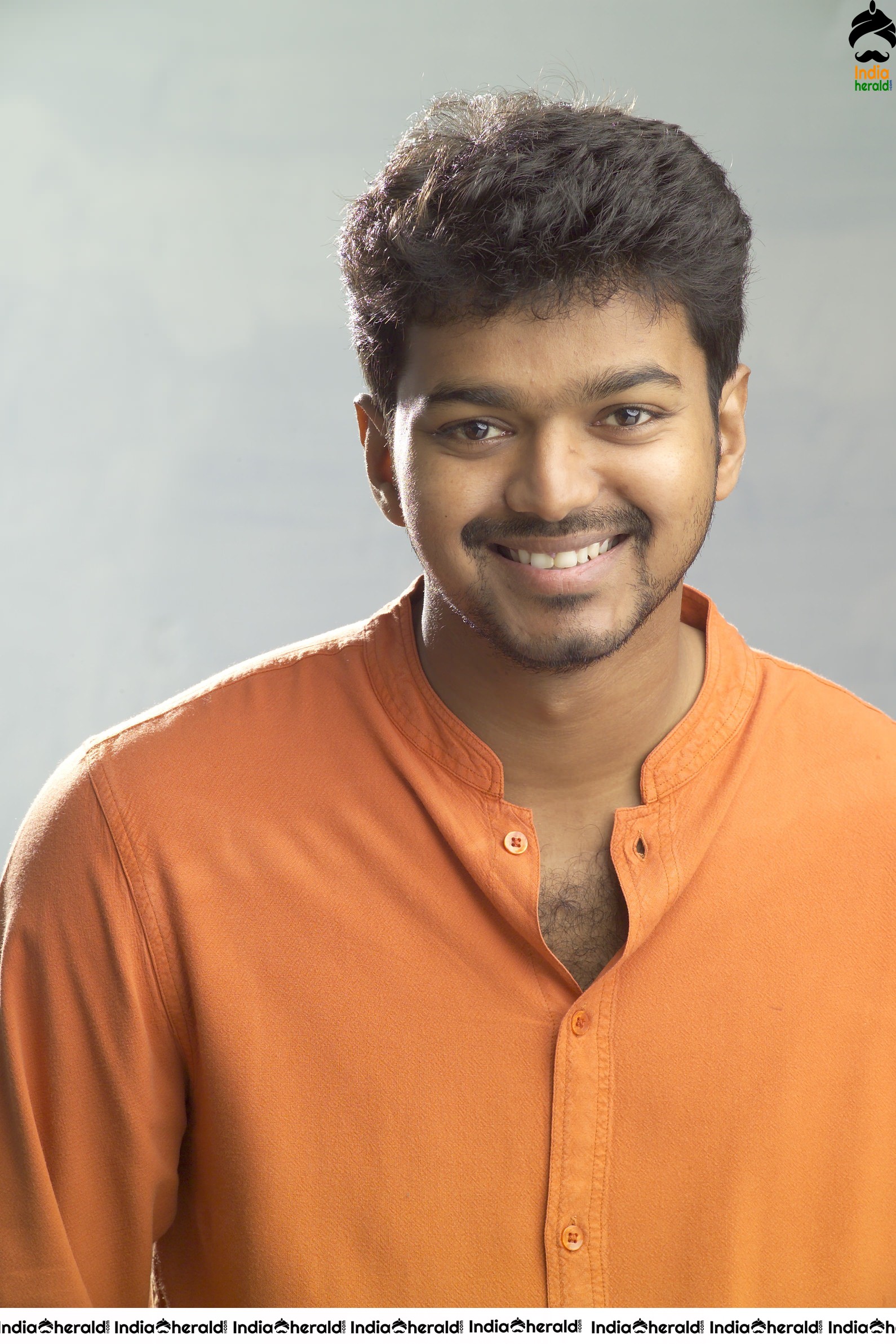 Actor Vijay Unseen Cute Photoshoot Stills in Orange Tee