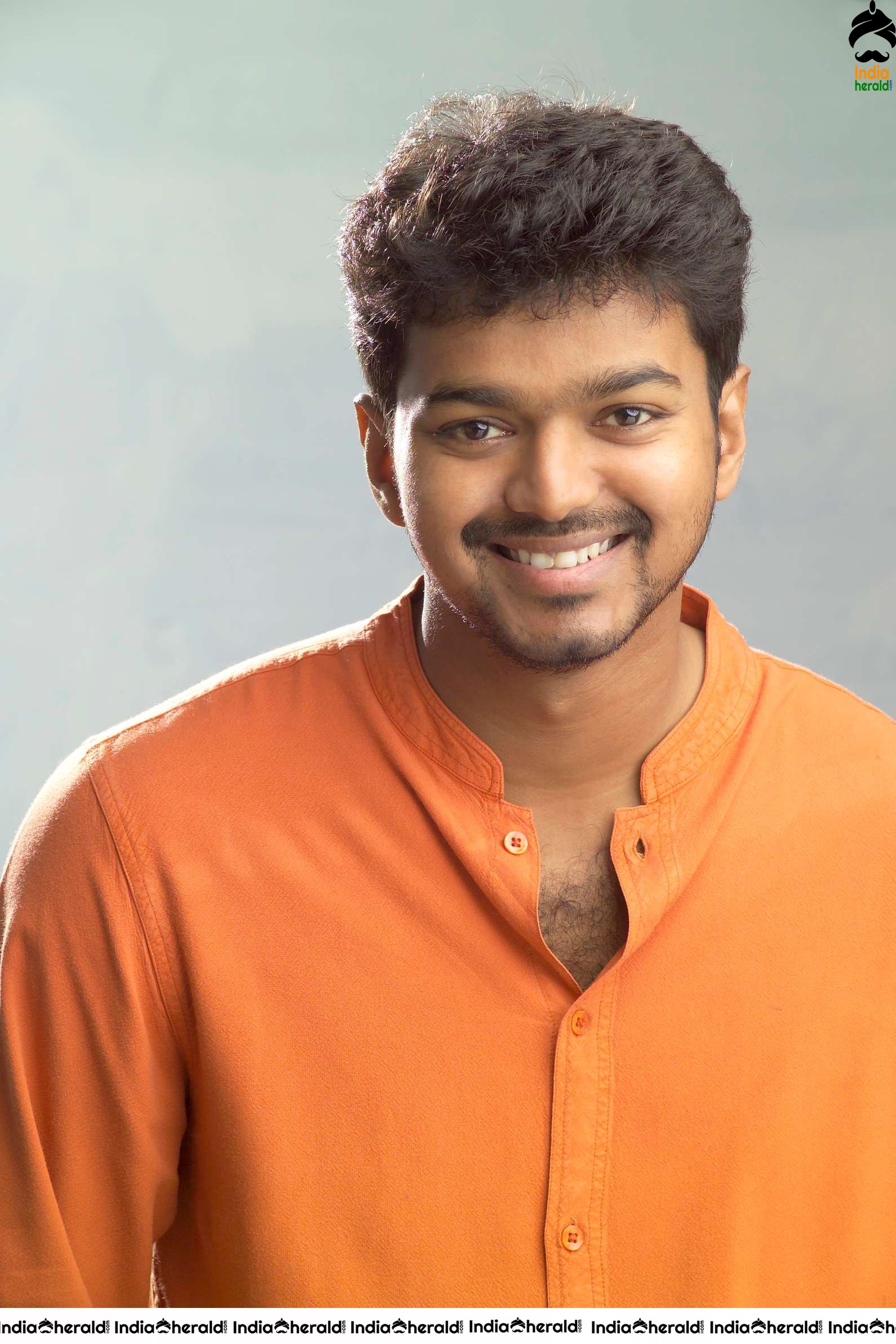 Actor Vijay Unseen Cute Photoshoot Stills in Orange Tee