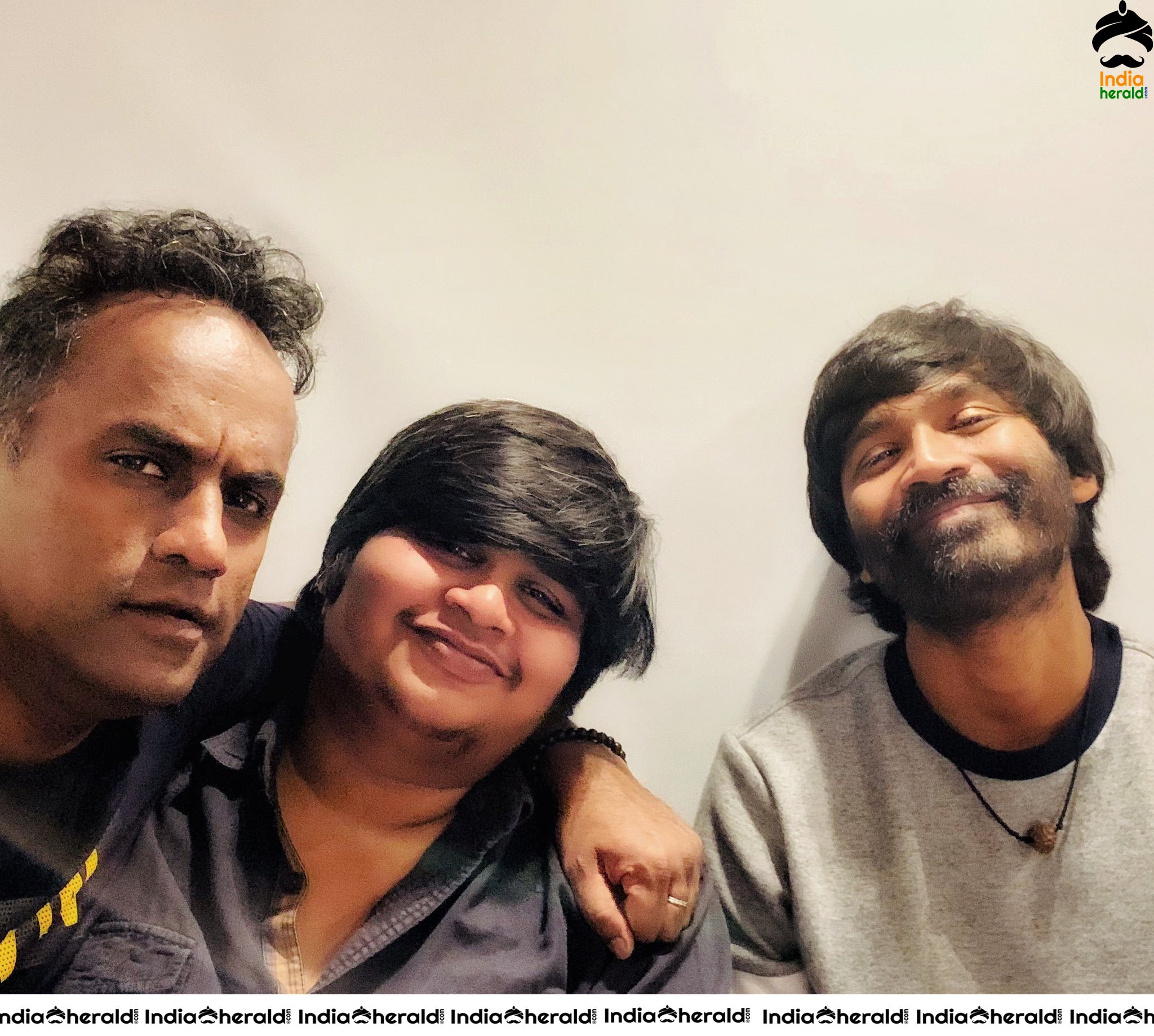 Dhanush and Karthik Subbaraj make happy faces at London