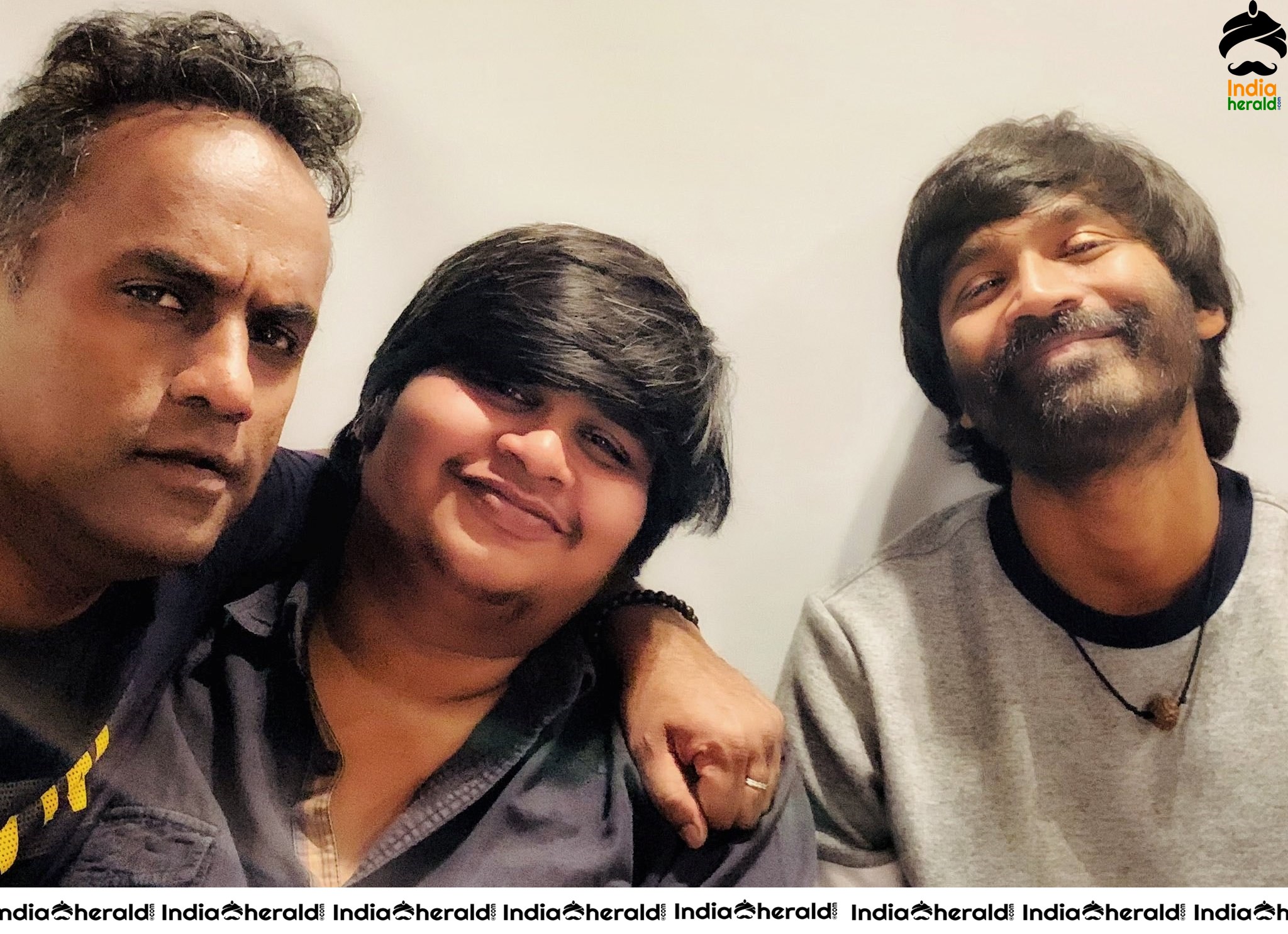 Dhanush and Karthik Subbaraj make happy faces at London