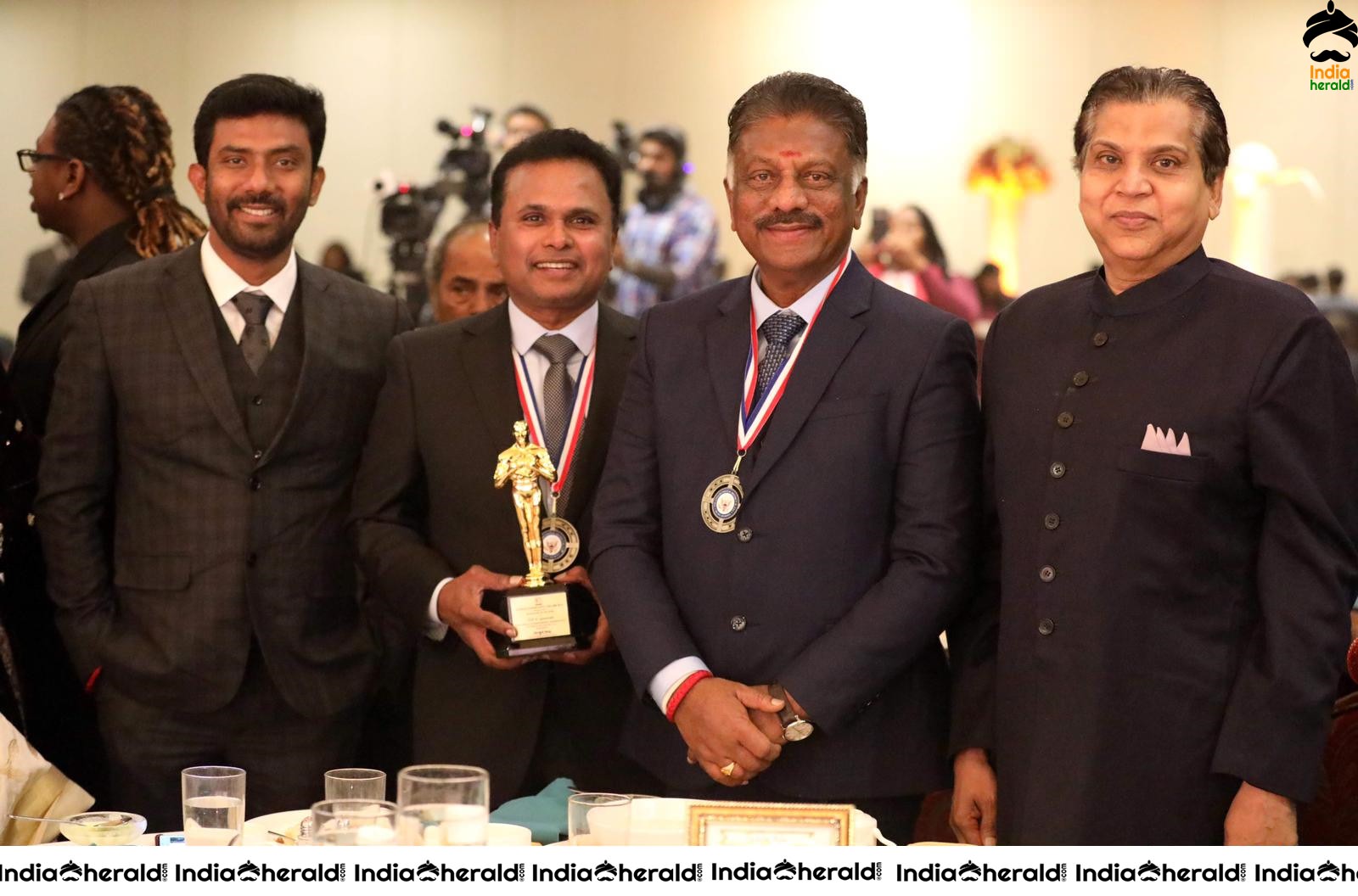 Film Maker Tel K Ganesan Receiving the Award at USA