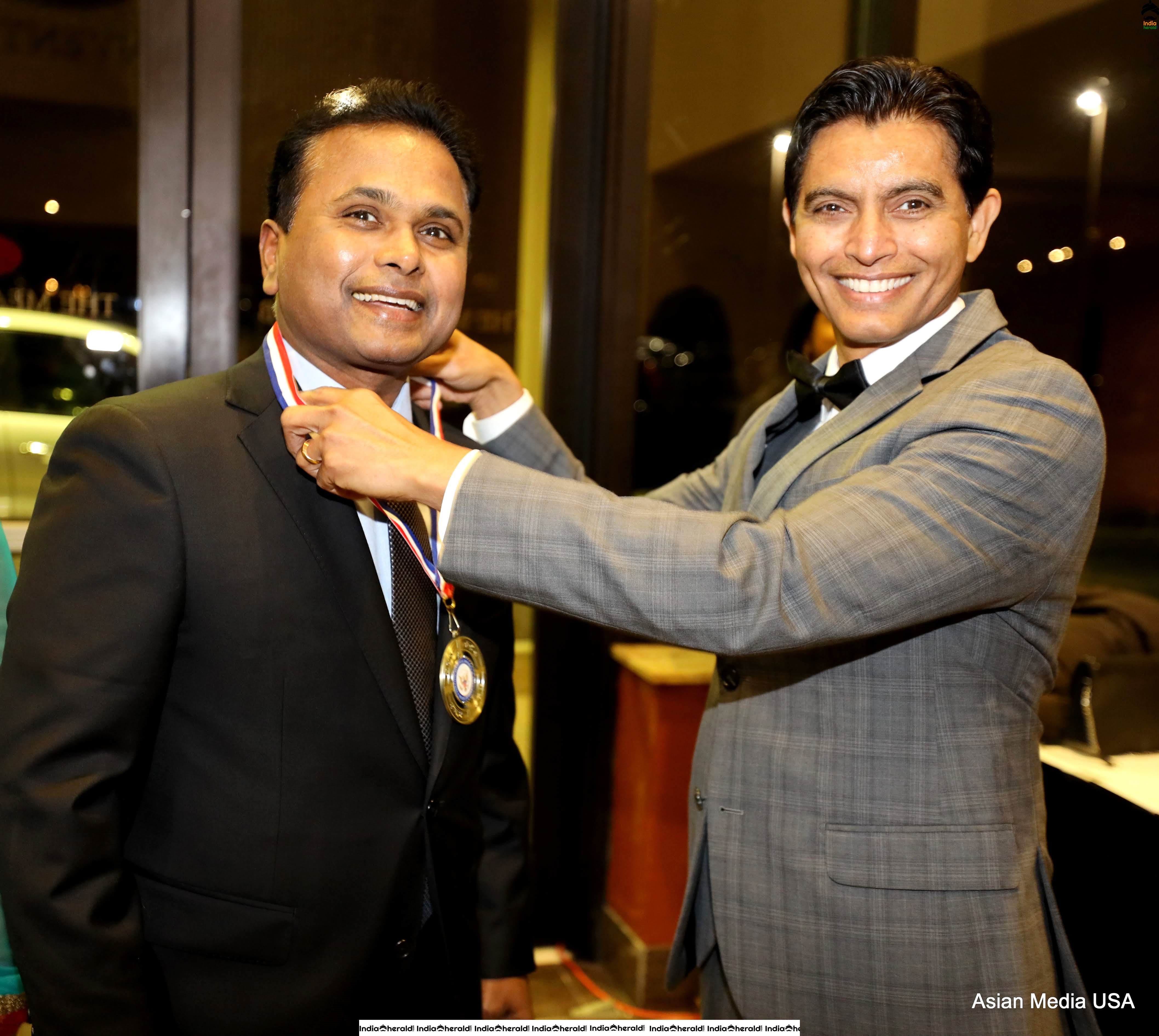 Film Maker Tel K Ganesan Receiving the Award at USA