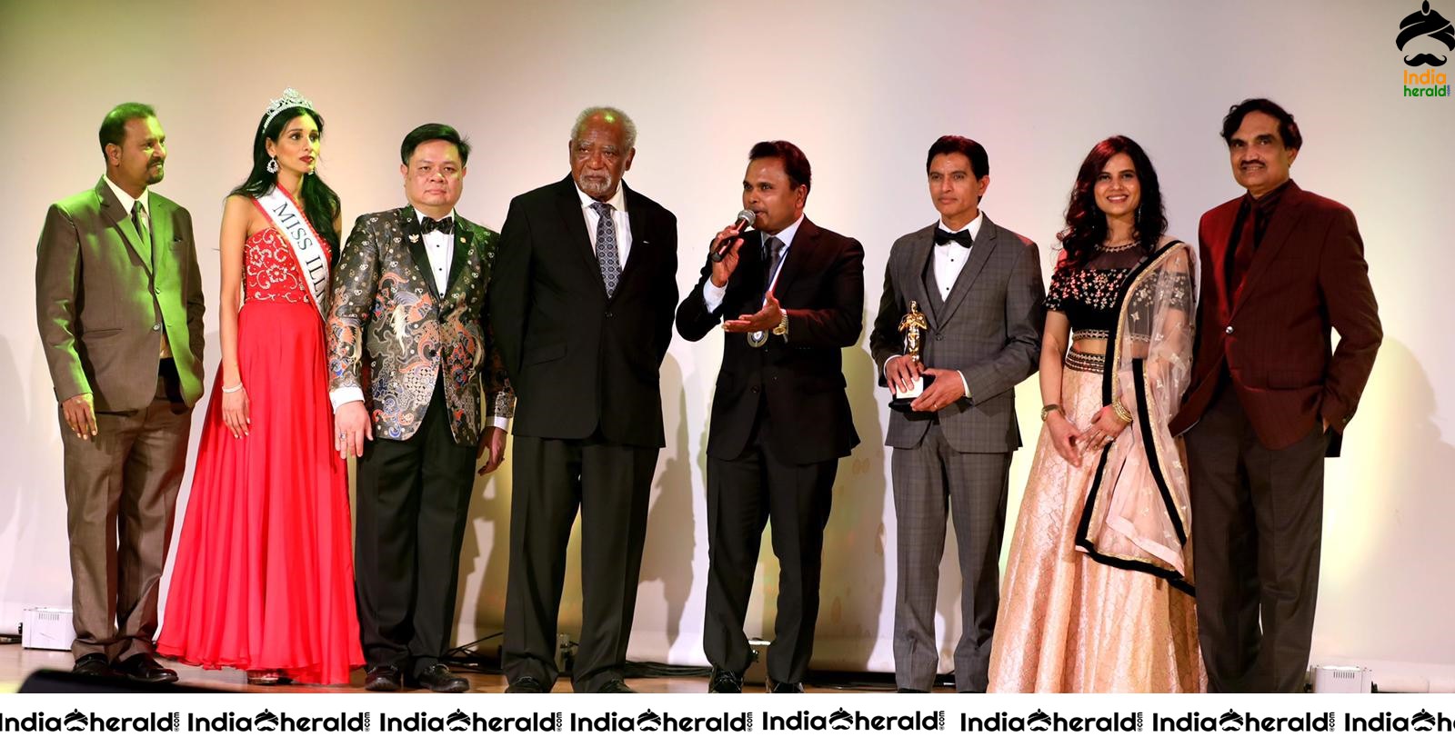 Film Maker Tel K Ganesan Receiving the Award at USA