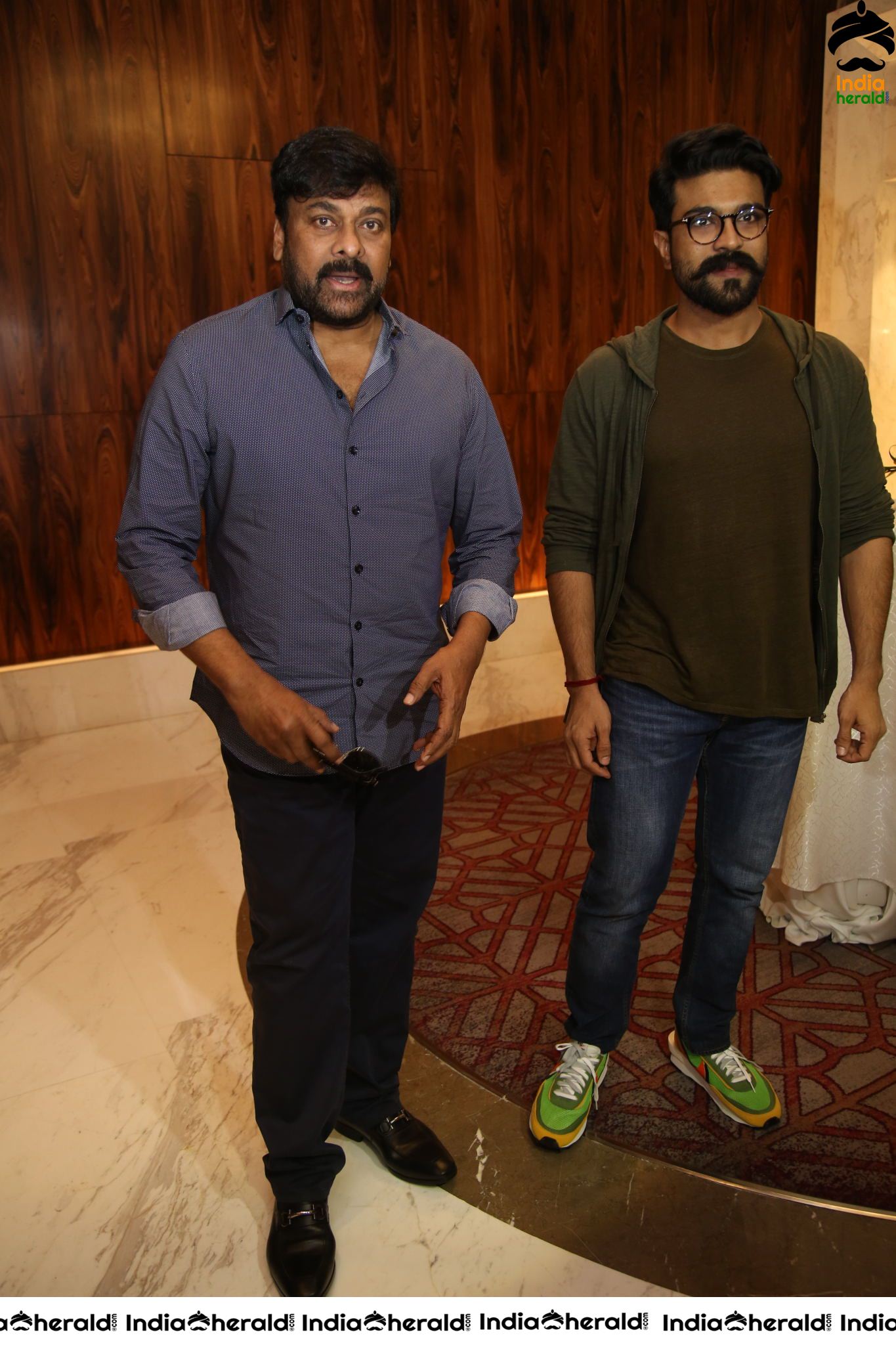 Mega Star Chiranjeevi and Ram Charan at Sye Raa Success Meet Set 2