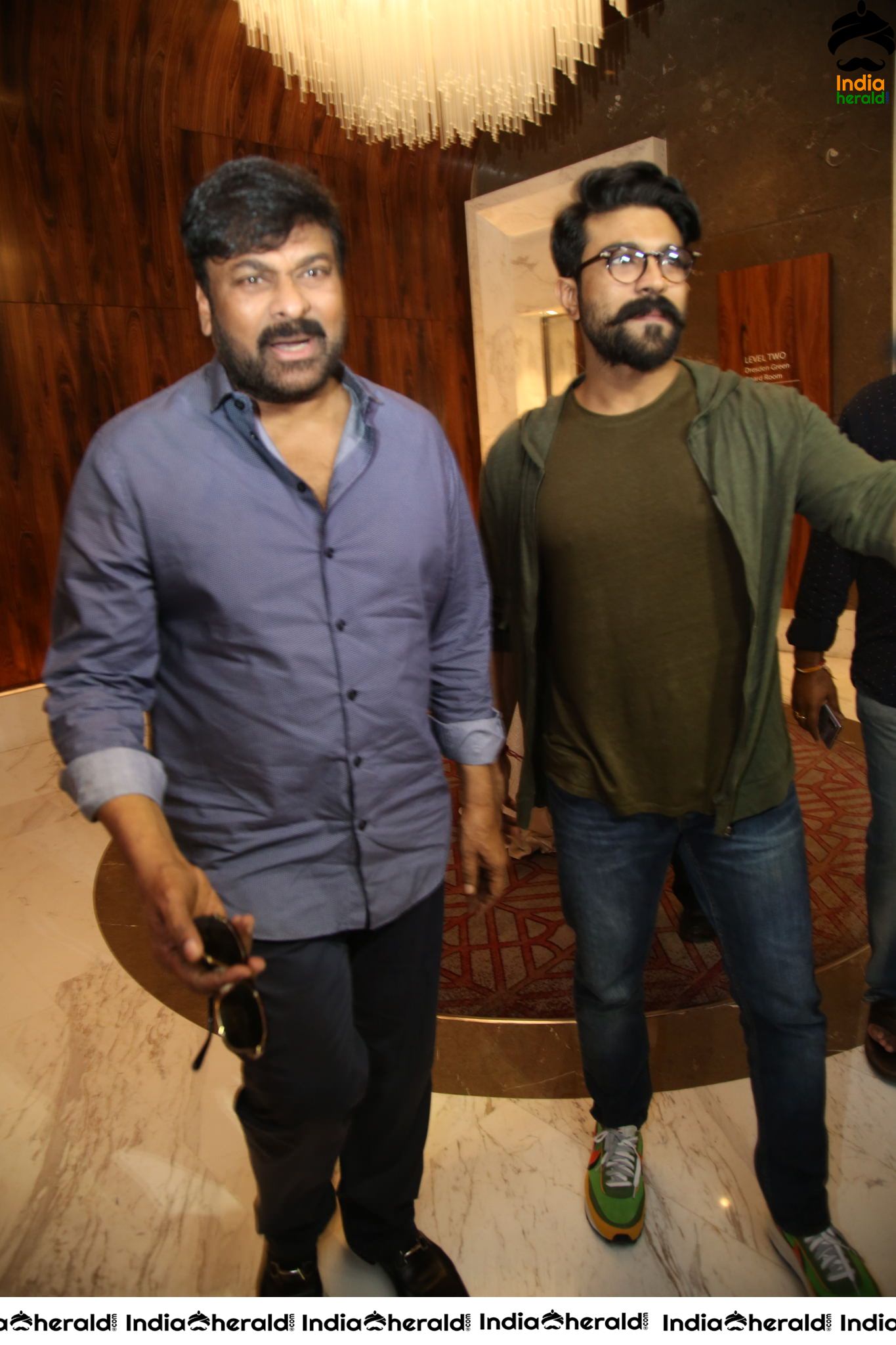 Mega Star Chiranjeevi and Ram Charan at Sye Raa Success Meet Set 2