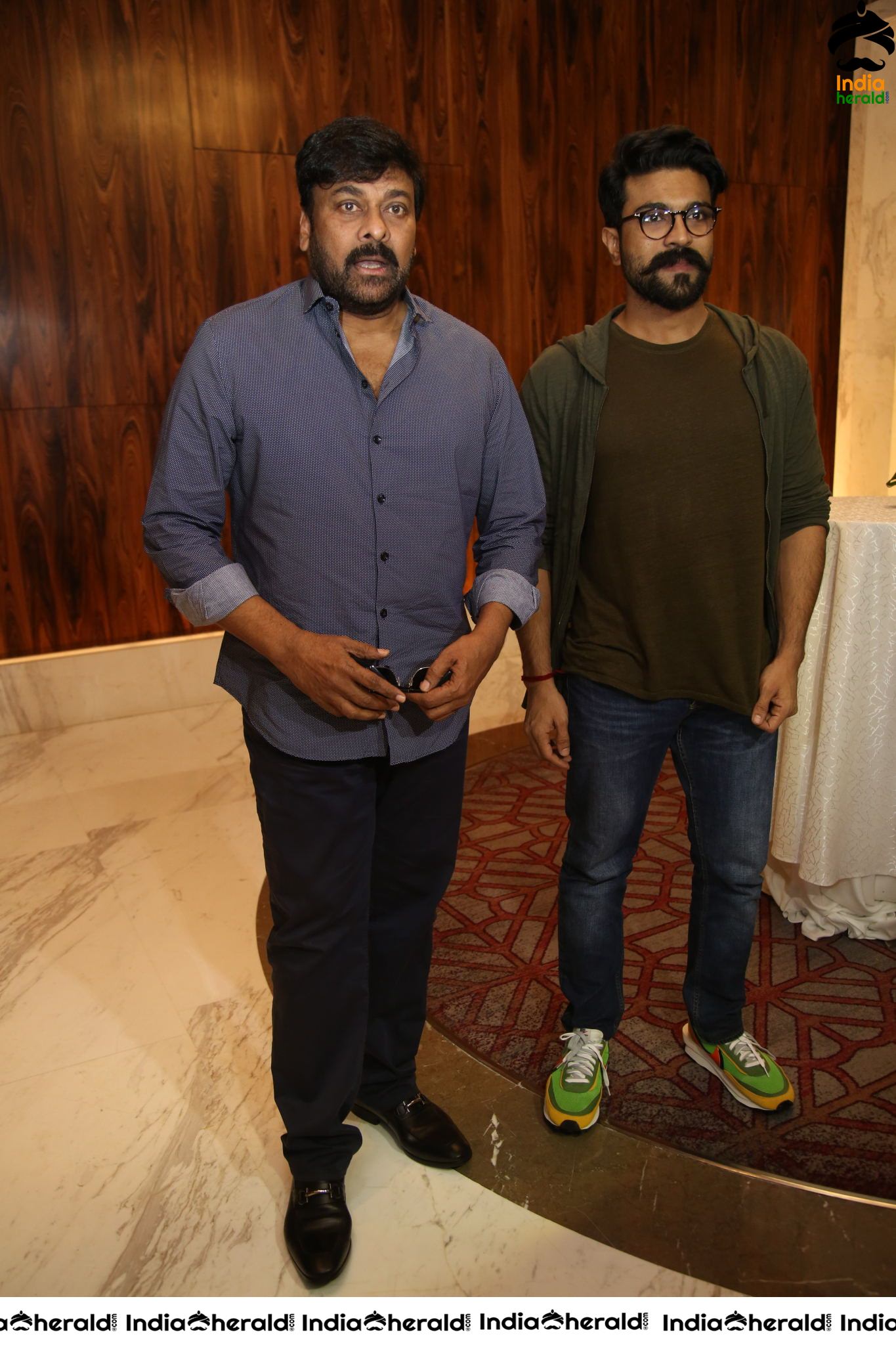 Mega Star Chiranjeevi and Ram Charan at Sye Raa Success Meet Set 2