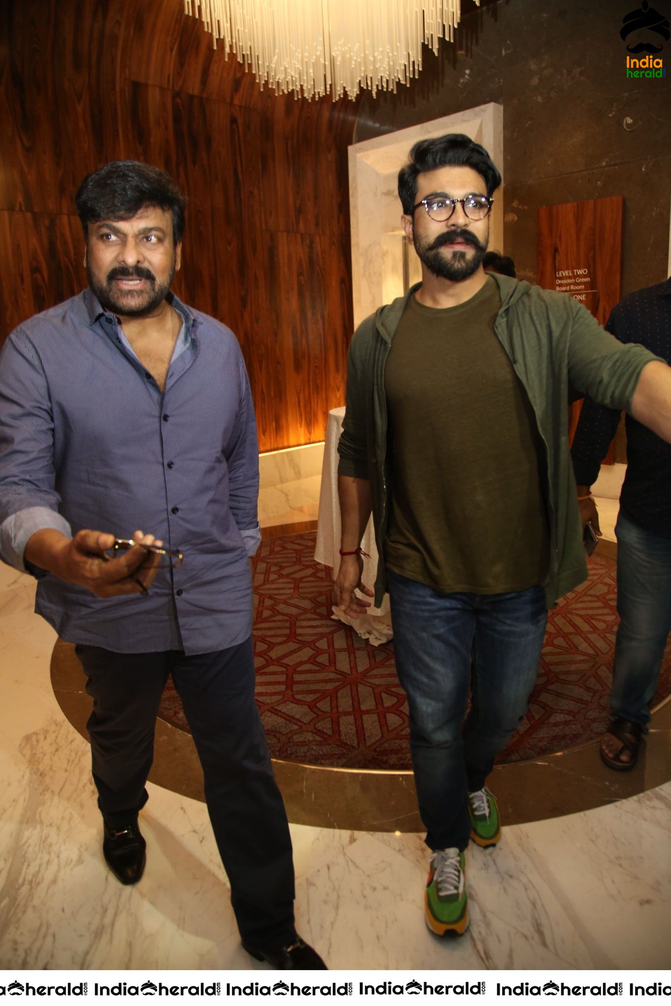 Mega Star Chiranjeevi and Ram Charan at Sye Raa Success Meet Set 2