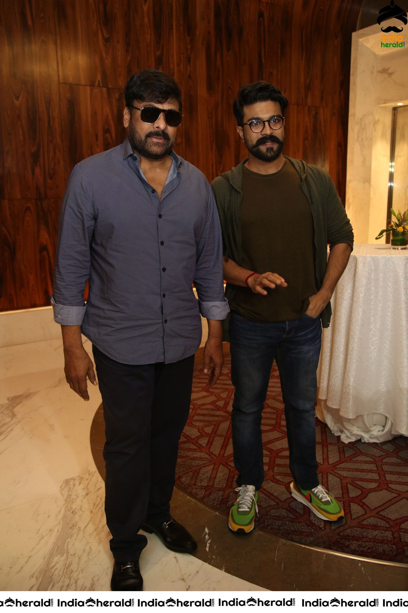 Mega Star Chiranjeevi and Ram Charan at Sye Raa Success Meet Set 2