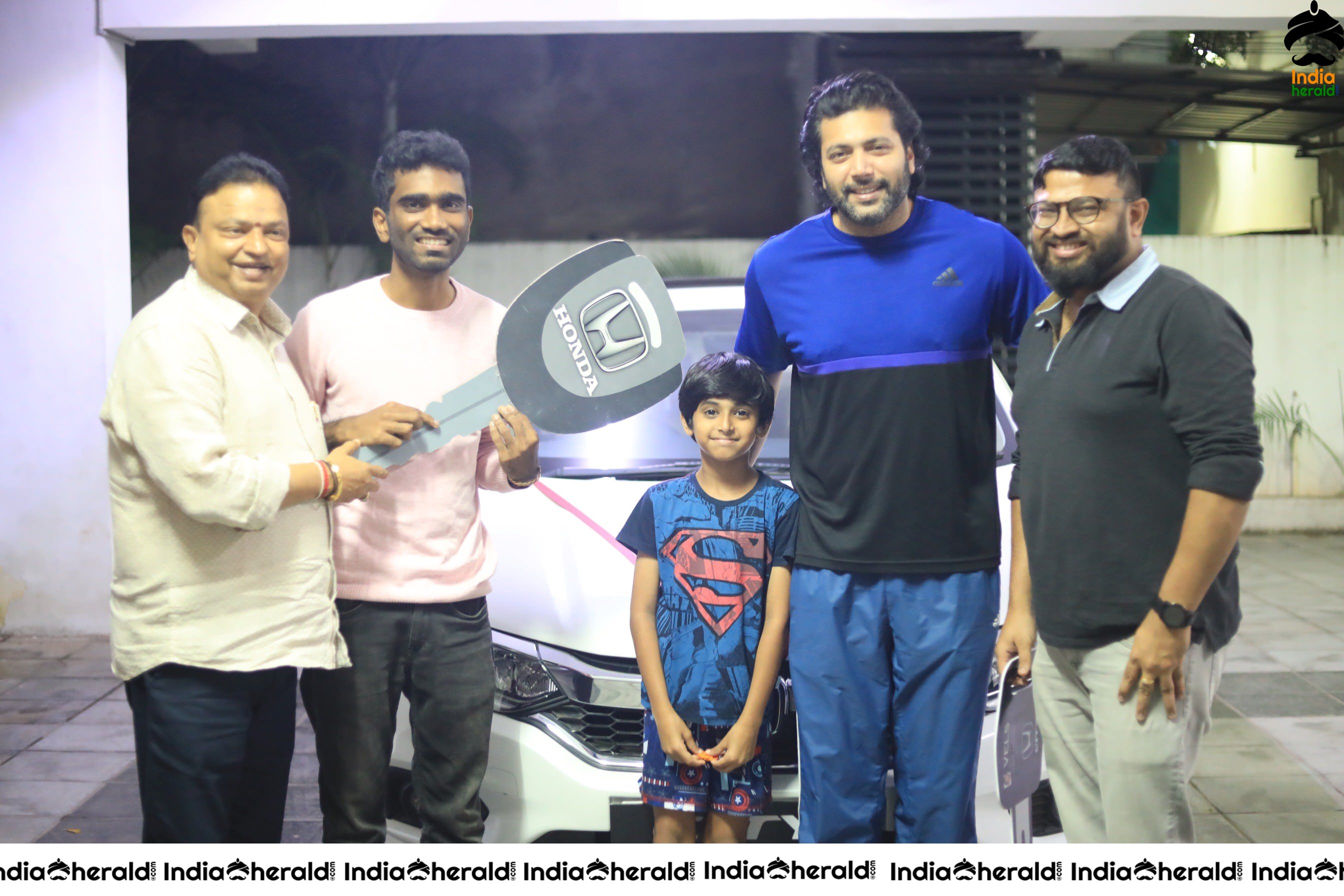 Producer Ishari K Ganesh Gifts A Luxurious Car To Director Pradeep On Comali Success