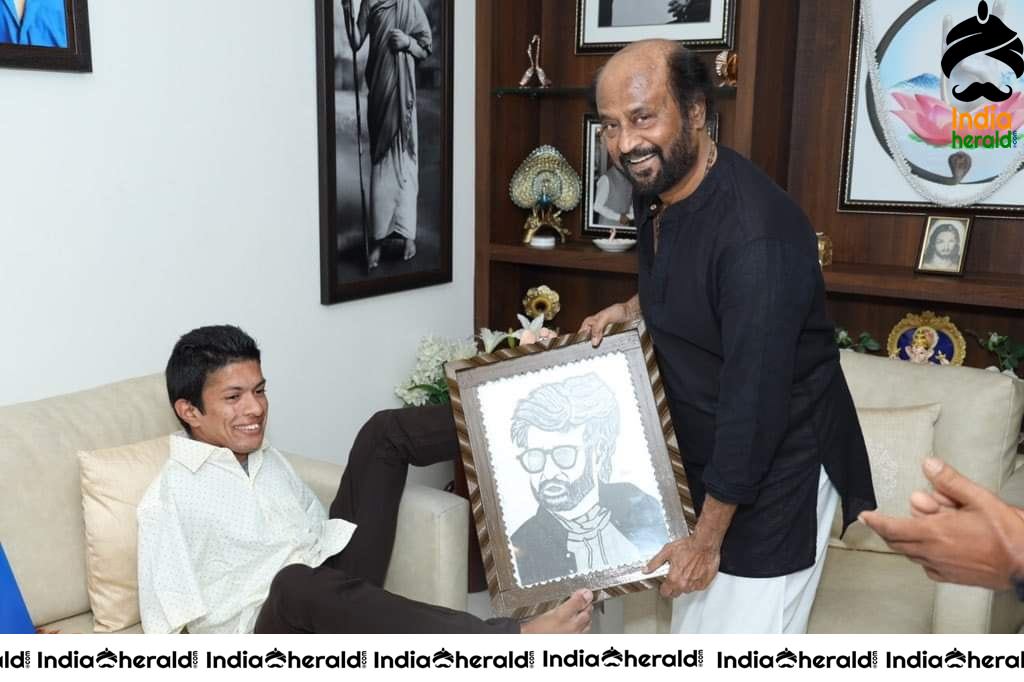Rajinikanth with differently abled artist Pranav from Kerala