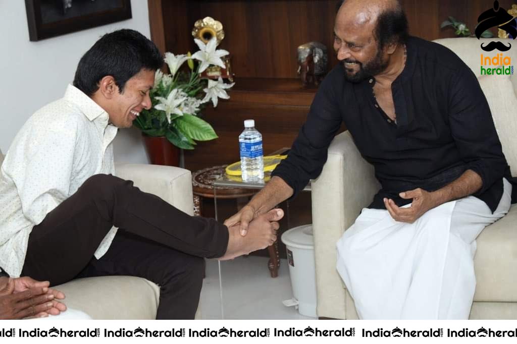 Rajinikanth with differently abled artist Pranav from Kerala