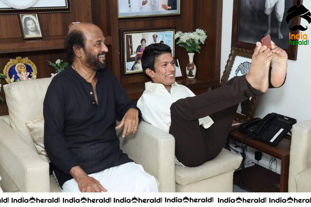 Rajinikanth with differently abled artist Pranav from Kerala