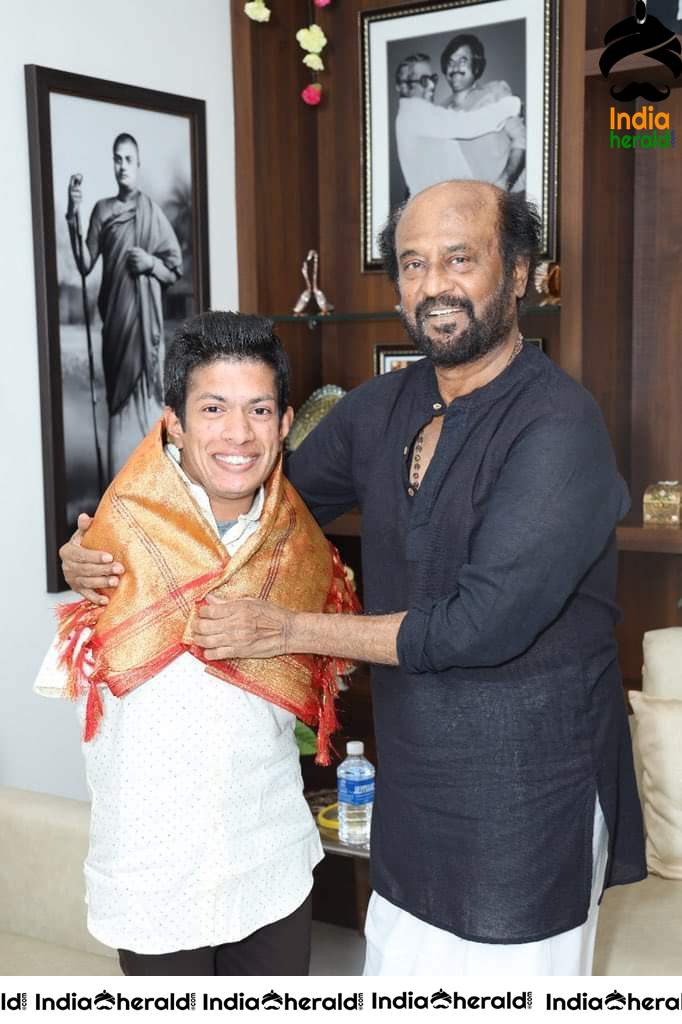 Rajinikanth with differently abled artist Pranav from Kerala