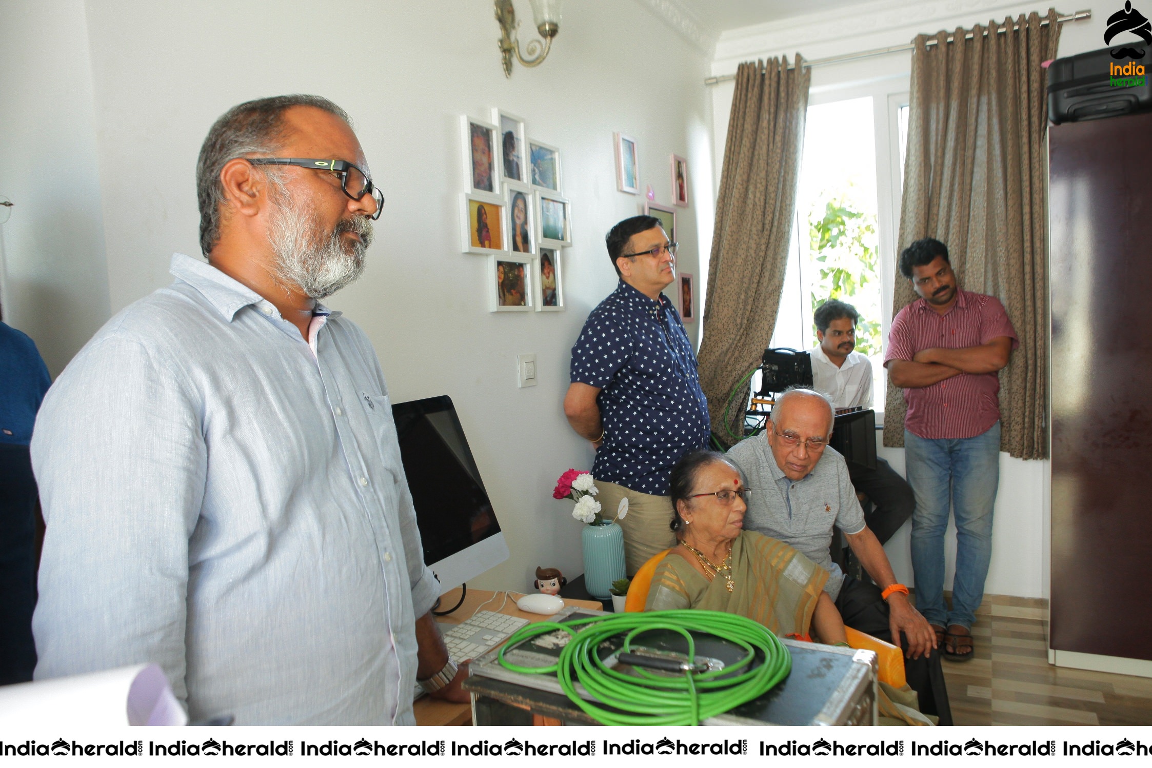 Senior Director SINGEETHAM garu at VALLIDHARI MADHYA movie sets STILLS Set 3